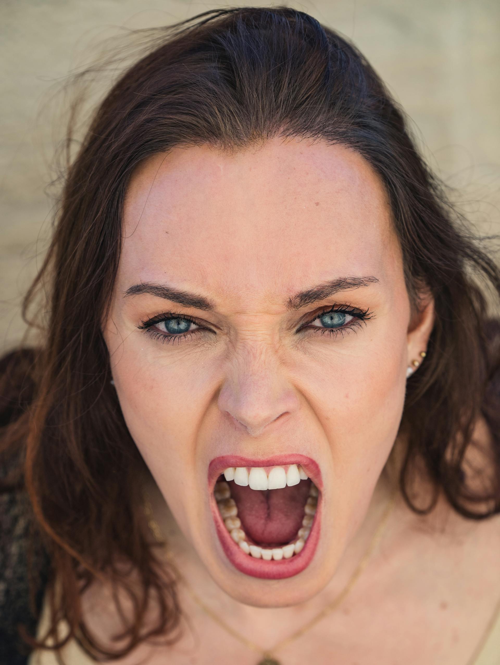A Mom of 7 Demanded My Deaf Grandpa Get Out of the Elevator—So I Brought Her Back to Reality 15 A woman yelling at someone | Source: Pexels