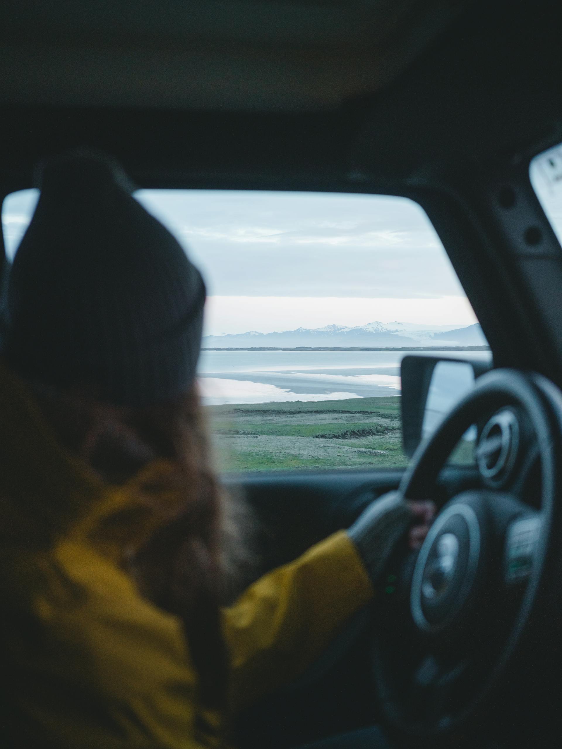 A woman driving a car | Source: Pexels
