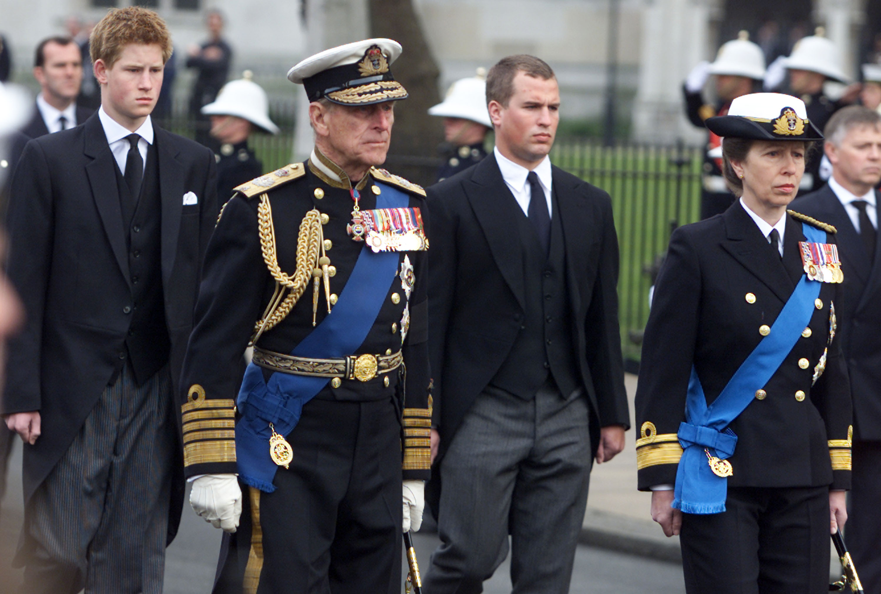 Prince Harry, Prince Phillip, Peter Phillips and Princess Anne walk behind the Royal coffin at the State Funeral of the Queen Mother April 9, 2002 outside Westminster Abbey in London. | Source: Getty Images
