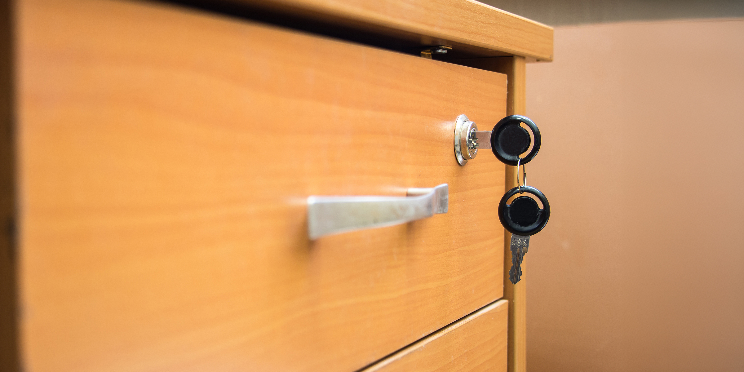 A desk drawer with a lock | Source: Shutterstock