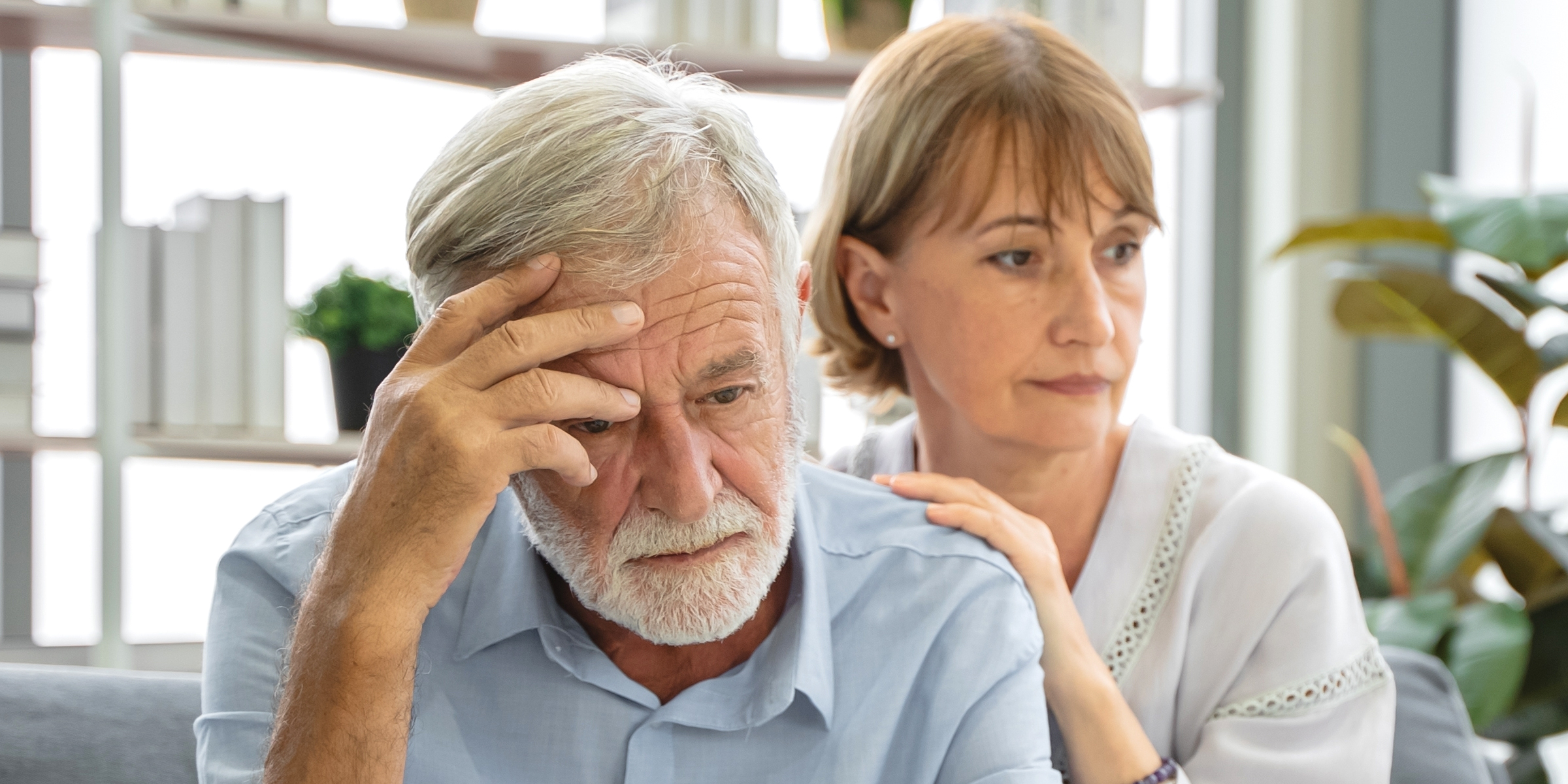A distressed elderly couple | Source: Shutterstock