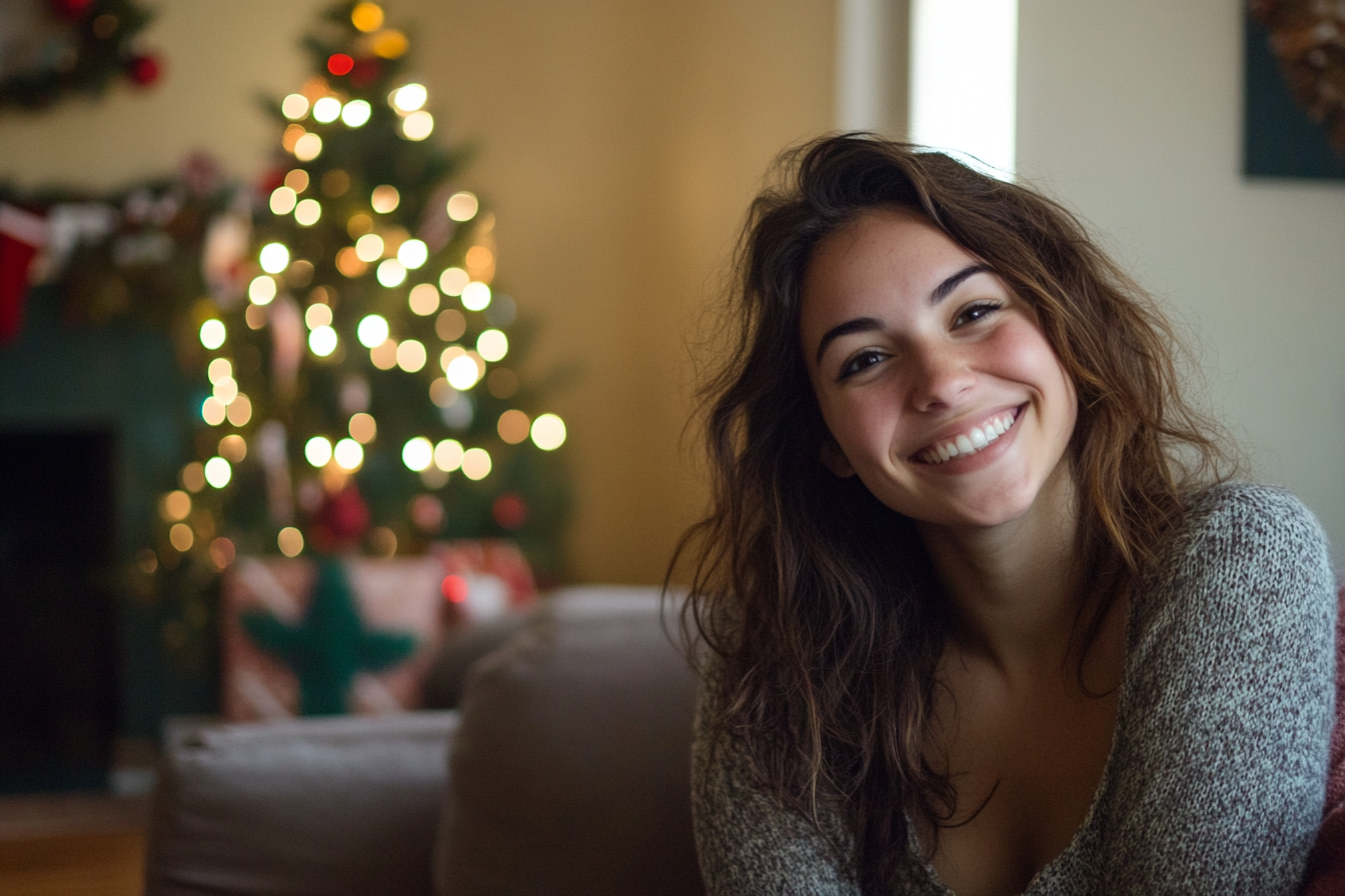 A woman sitting in a living room on Christmas | Source: Midjourney