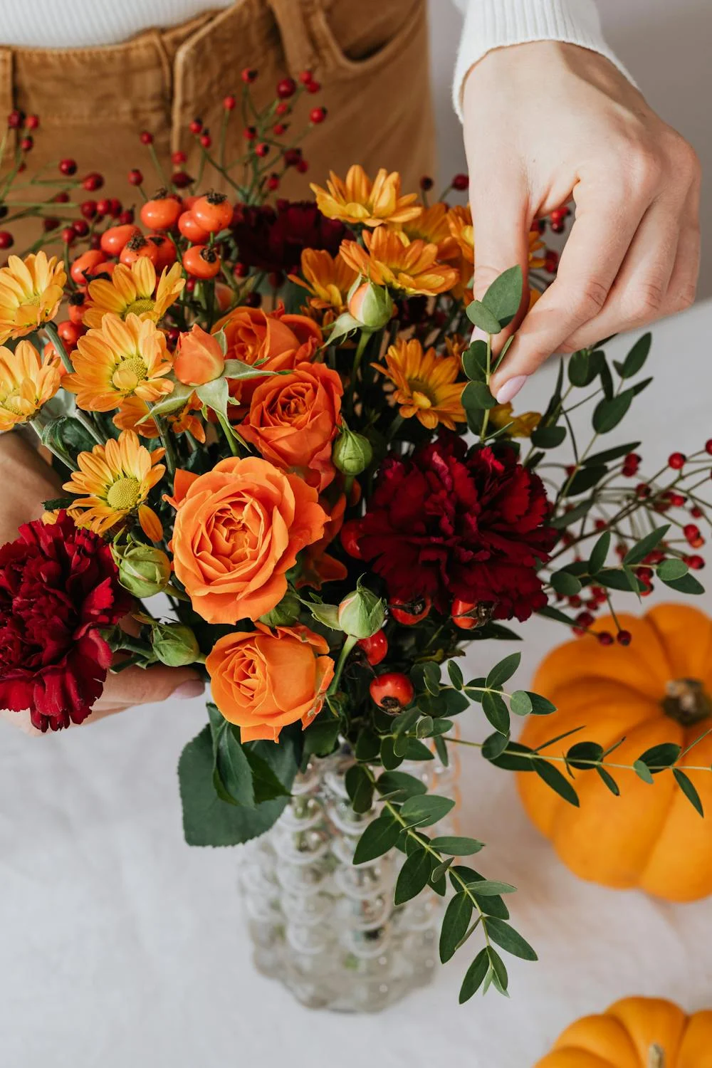 Arranging flowers | Source: Pexels