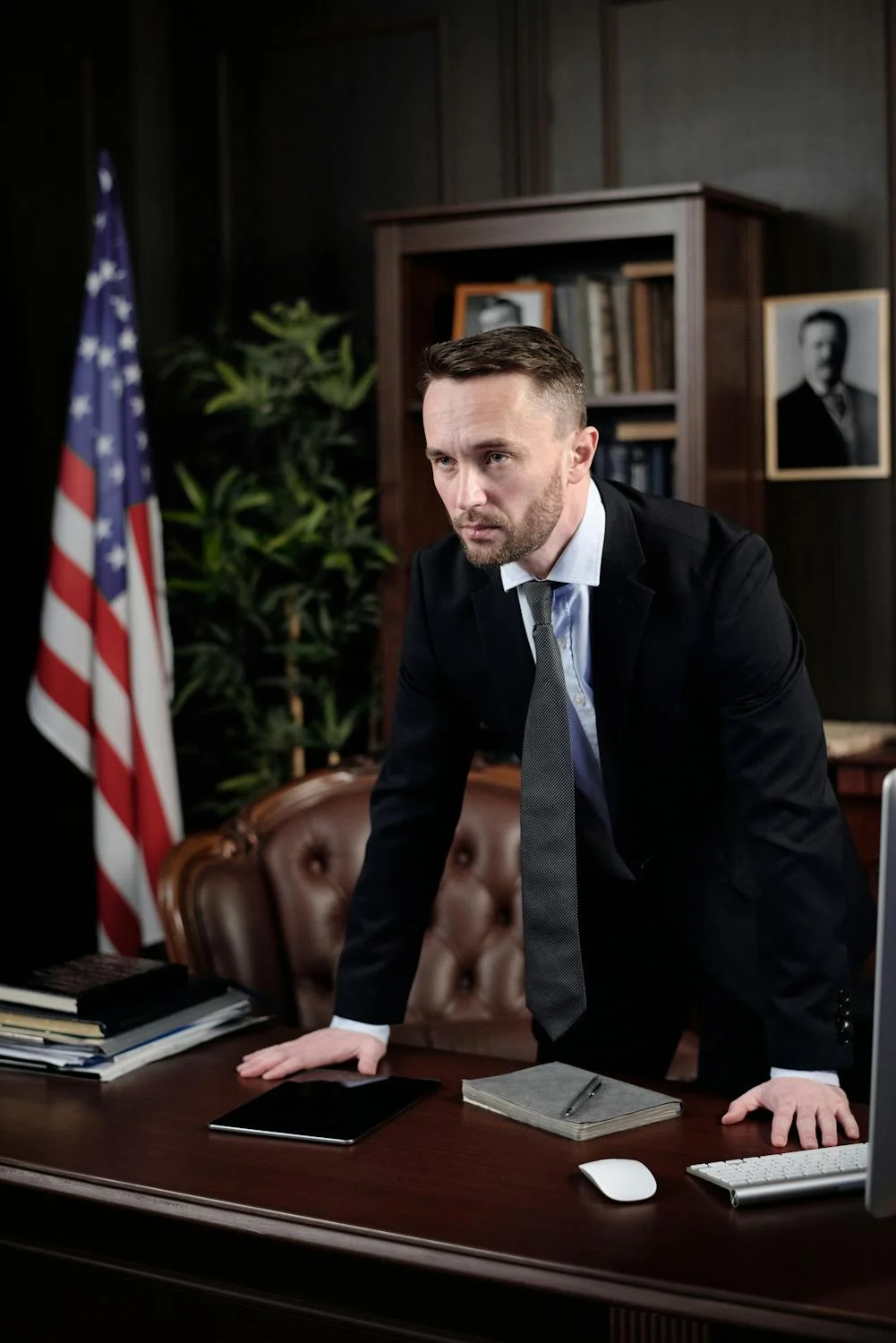 A lawyer standing in his office | Source: Pexels