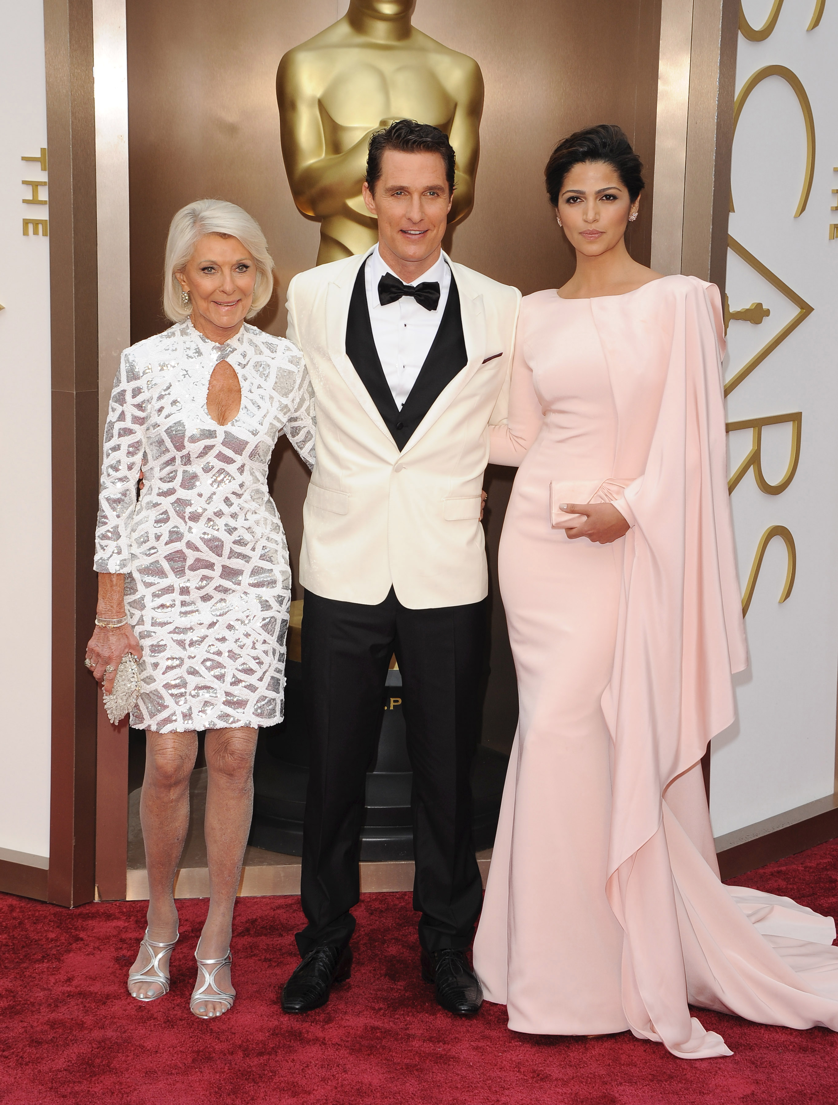 Mary Kathleen McCabe, Matthew McConaughey and Camila Alves at the 86th Annual Academy Awards at Hollywood & Highland Center on March 2, 2014 | Source: Getty Images