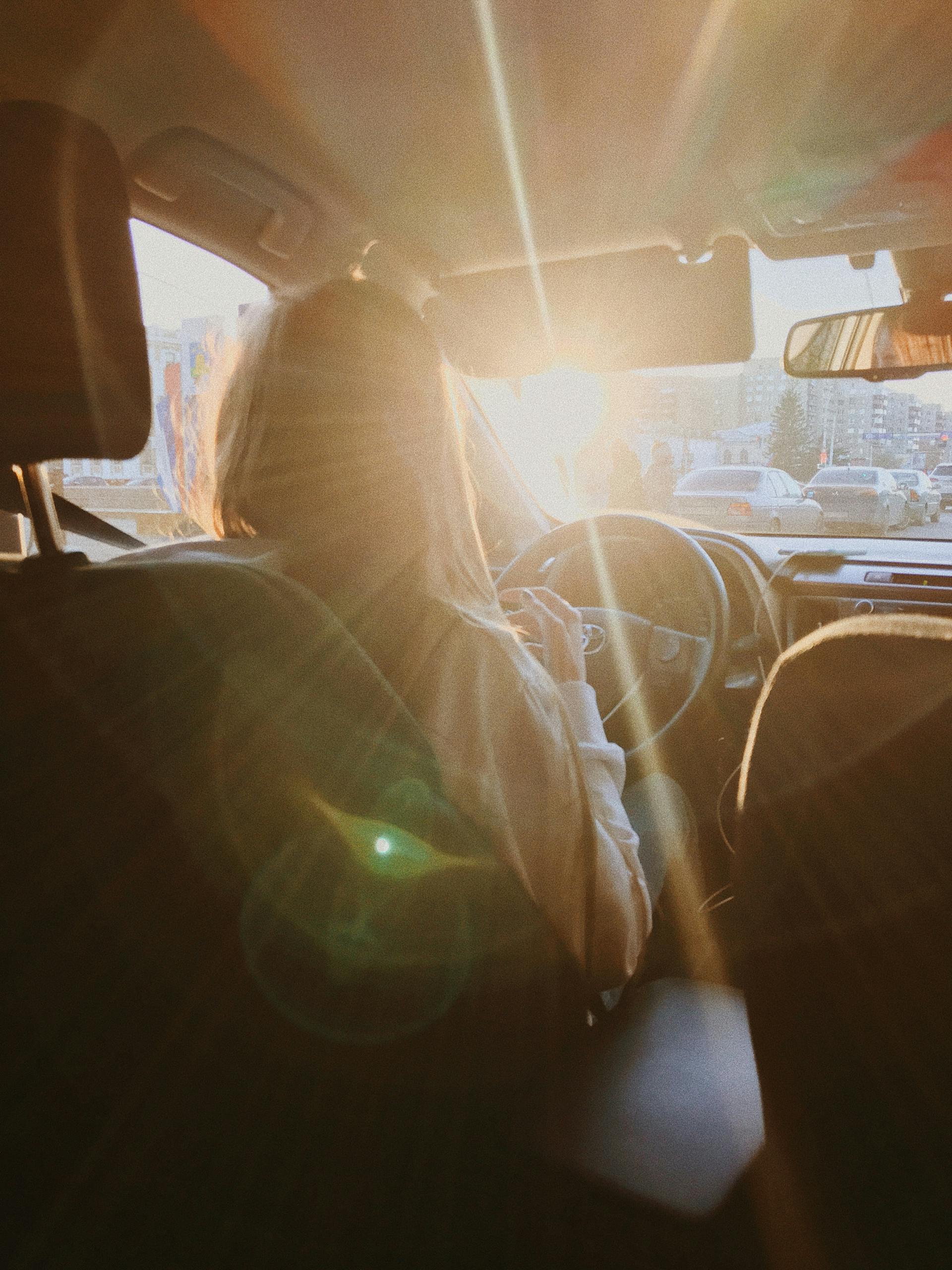 A woman driving a car | Source: Pexels