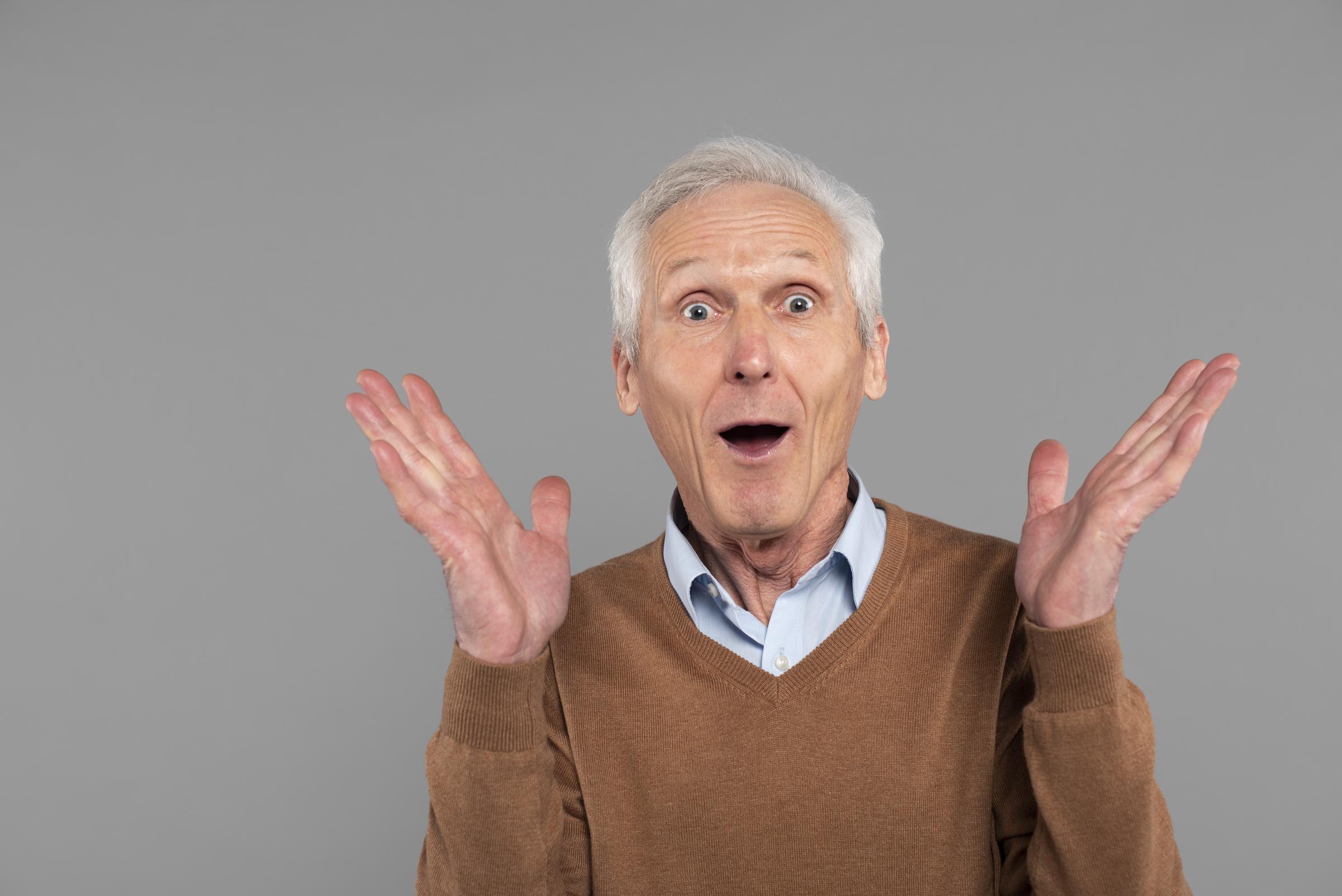 A surprised elderly man | Source: Freepik