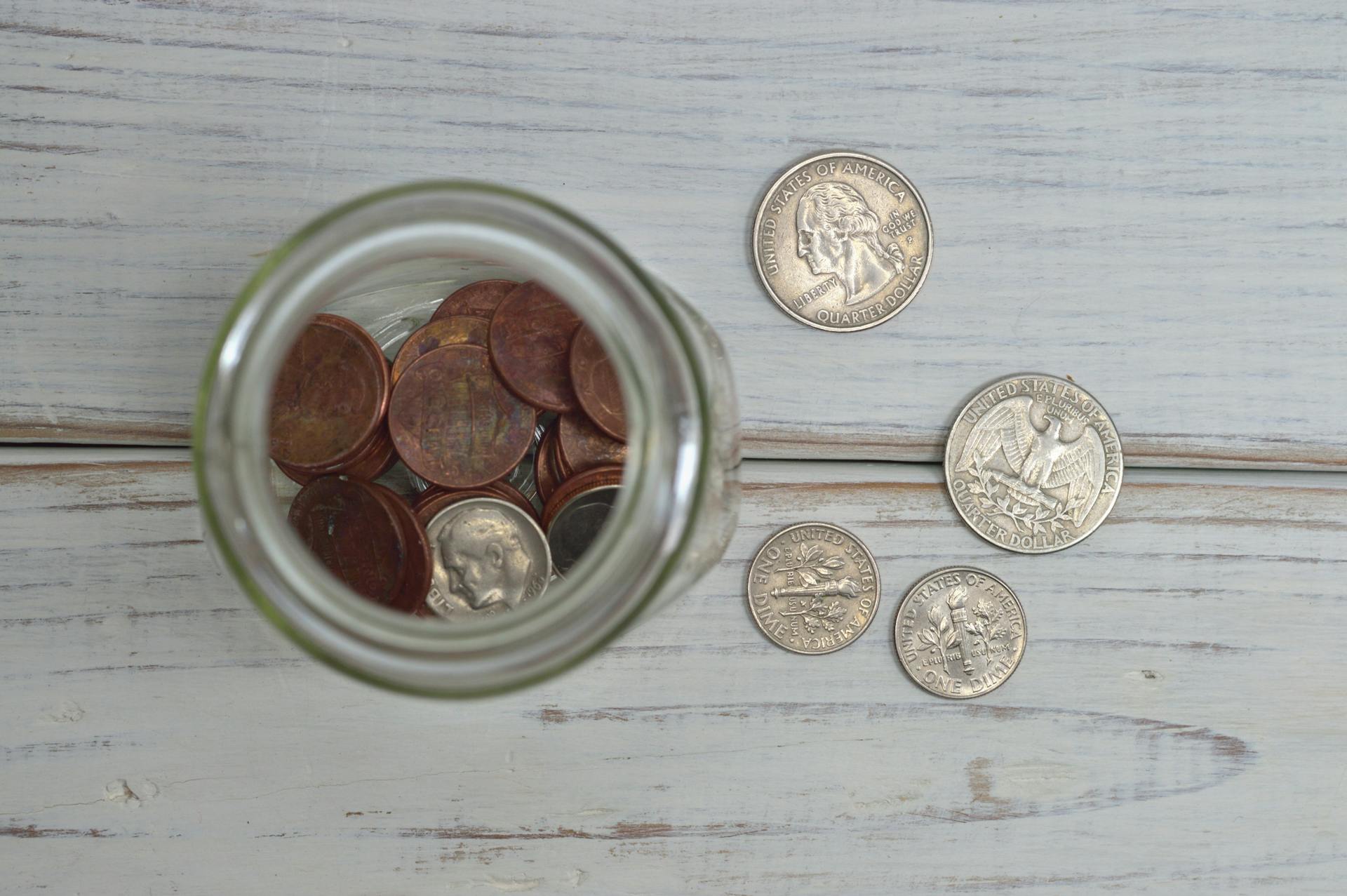 Coins in a glass jar | Source: Pexels