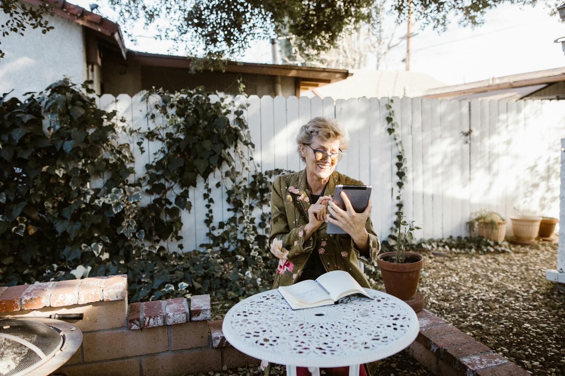 A woman relaxing in her garden | Source: Pexels