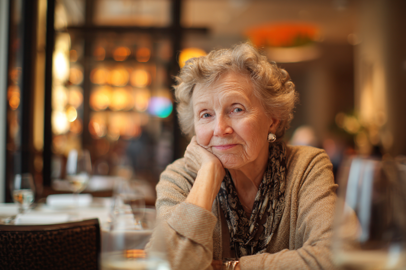 A woman in a restaurant staring at someone with disapproval | Source: Midjourney