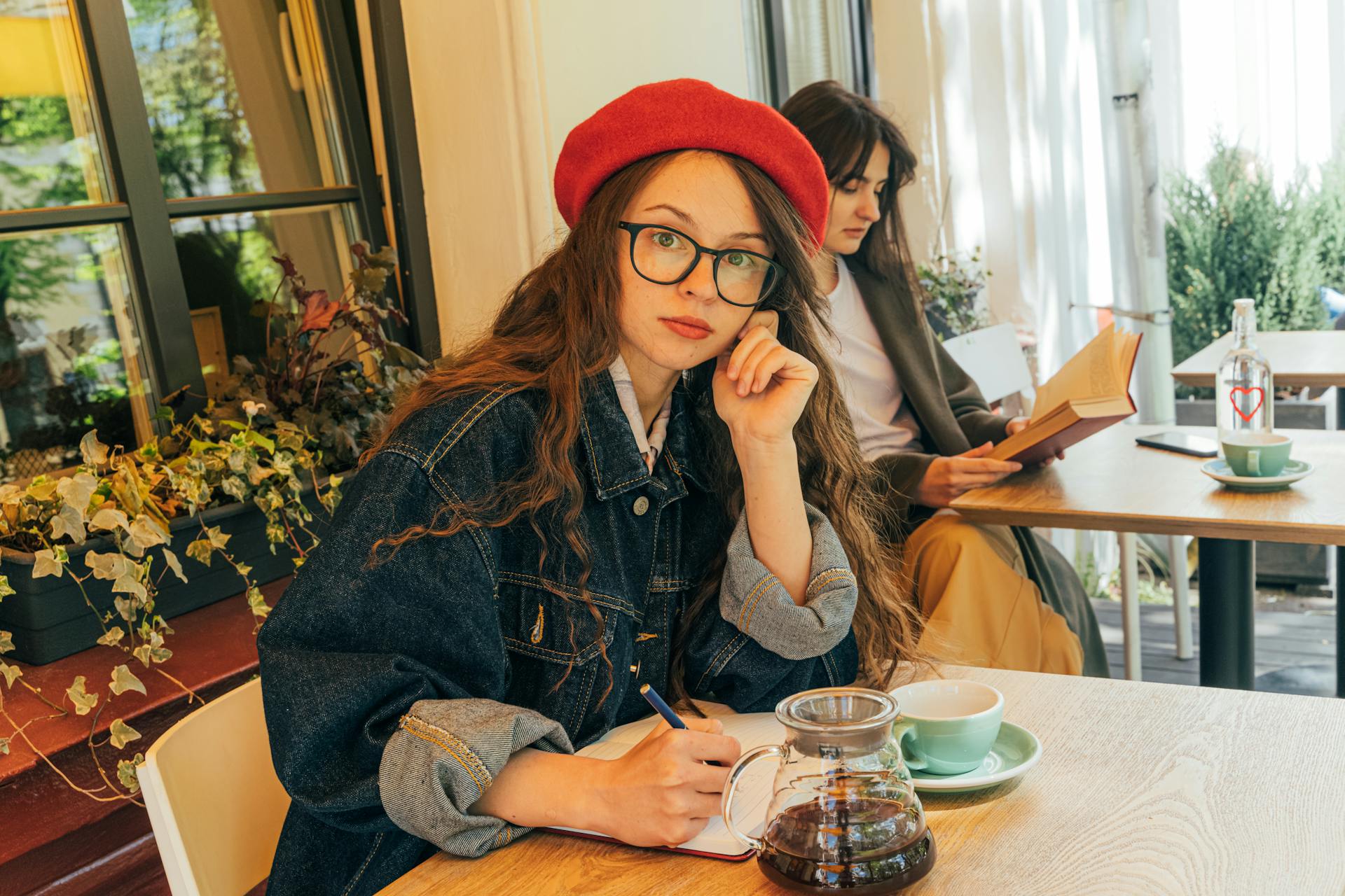 A woman in a coffee shop | Source: Pexels