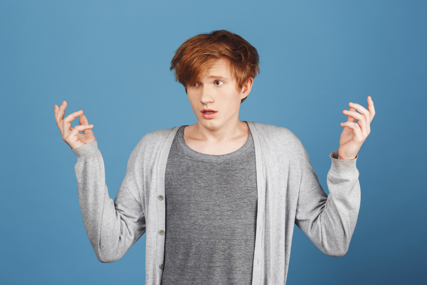 A startled teenage boy | Source: Freepik