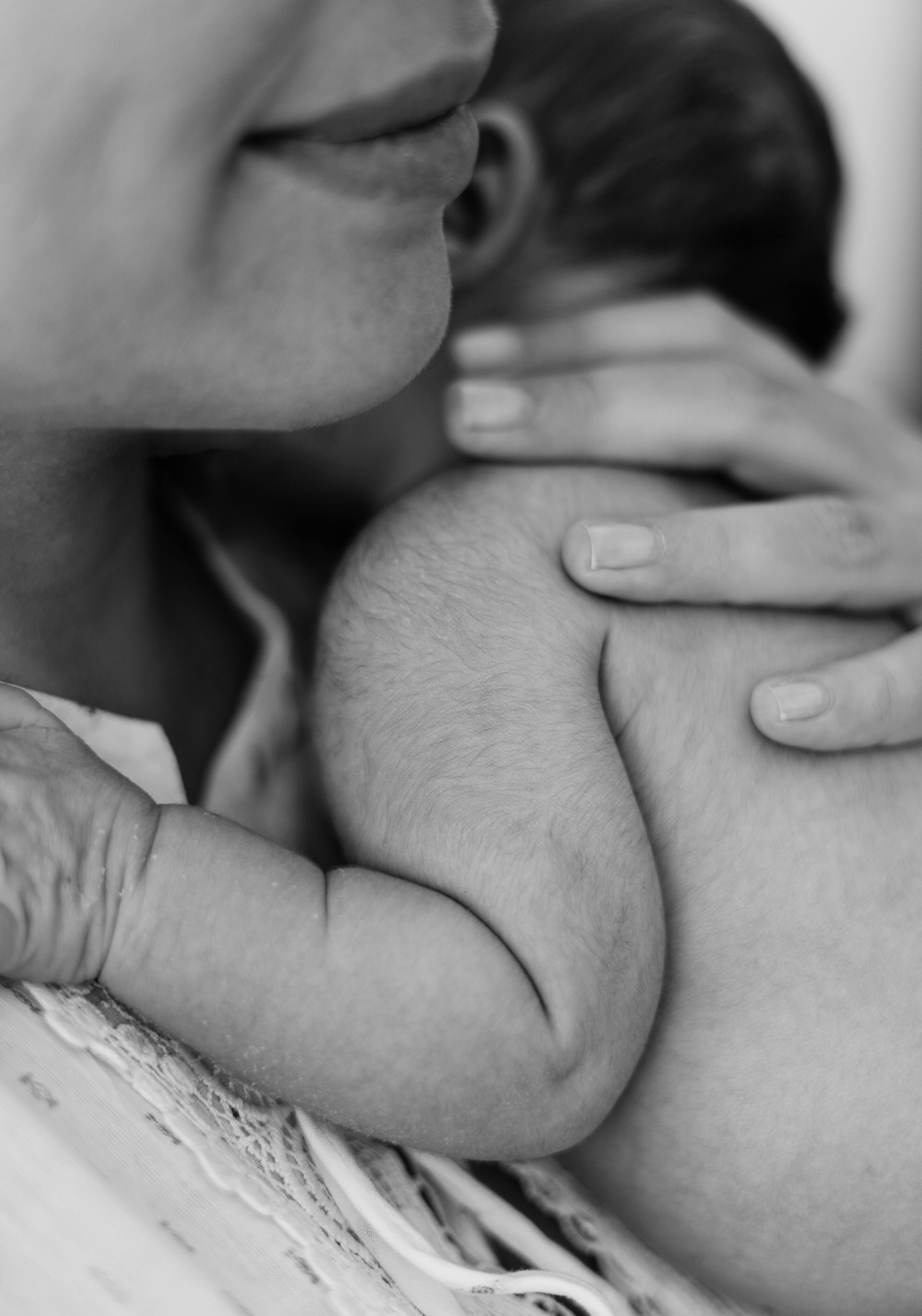 A close-up shot of a mother holding her newborn baby | Source: Pexels