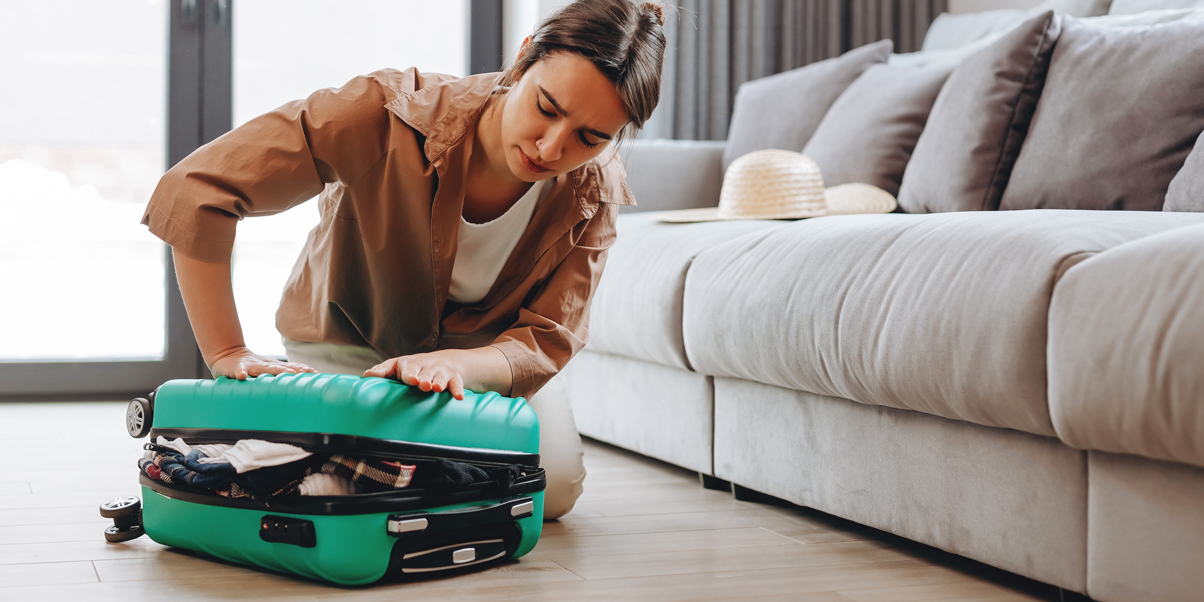 A woman packing | Source: Shutterstock