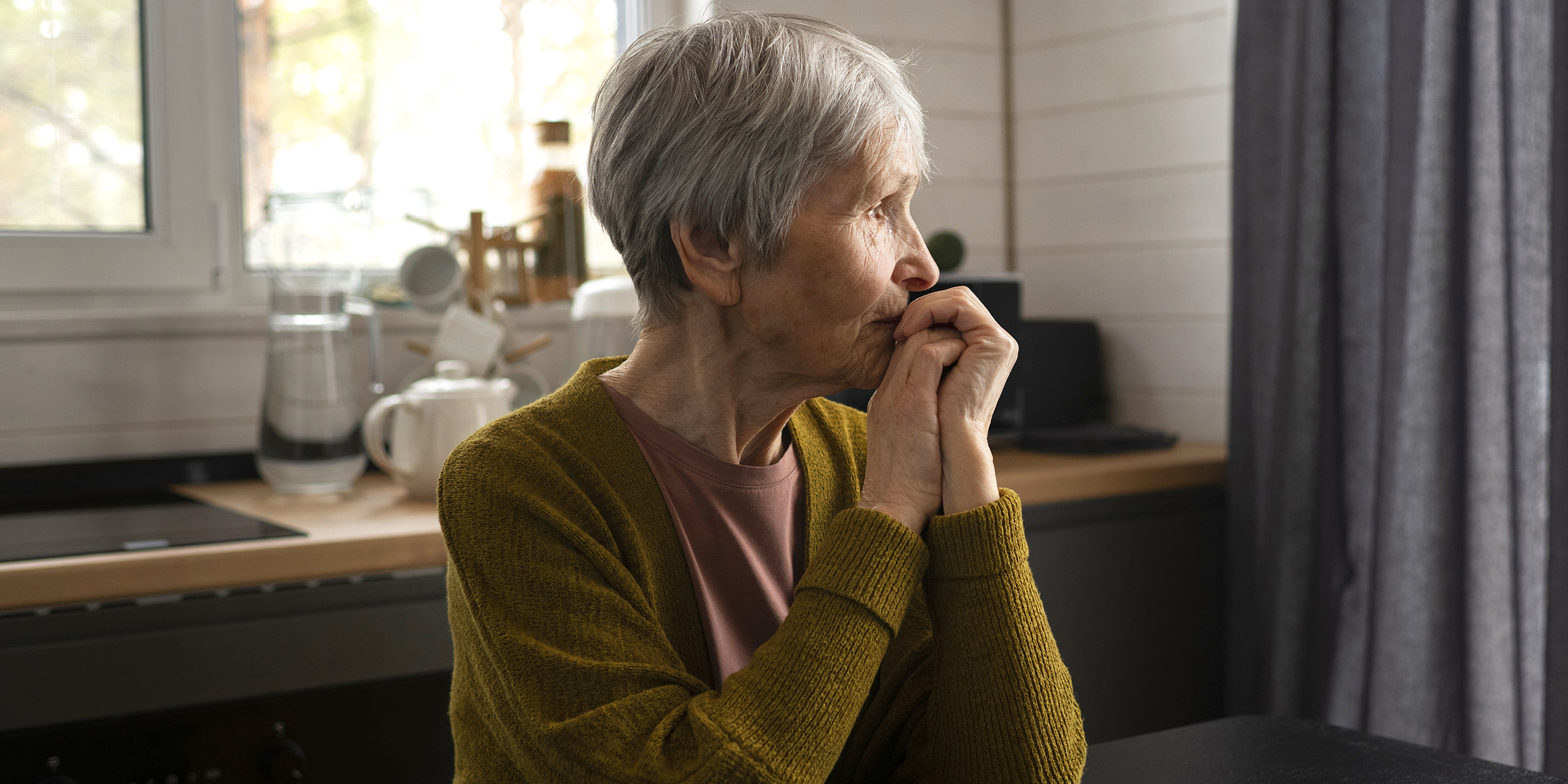 A sad-looking woman | Source: Freepik