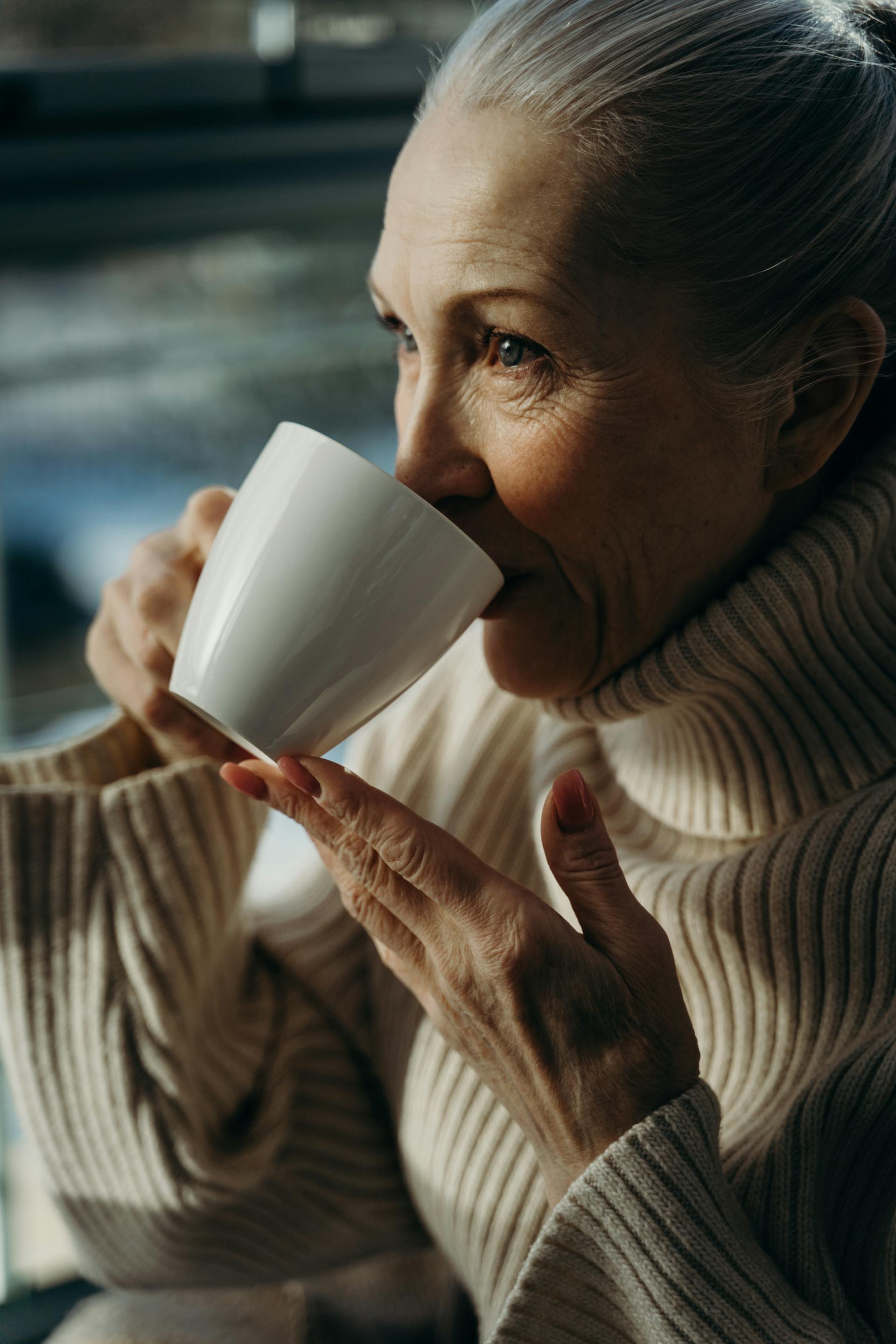 A senior woman drinking coffee | Source: Pexels