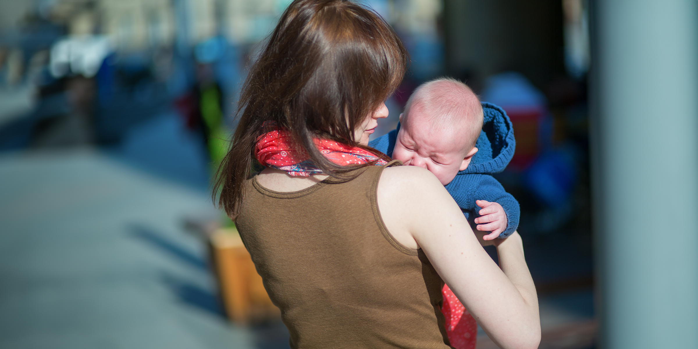 A mother with her newborn baby | Source: Shutterstock