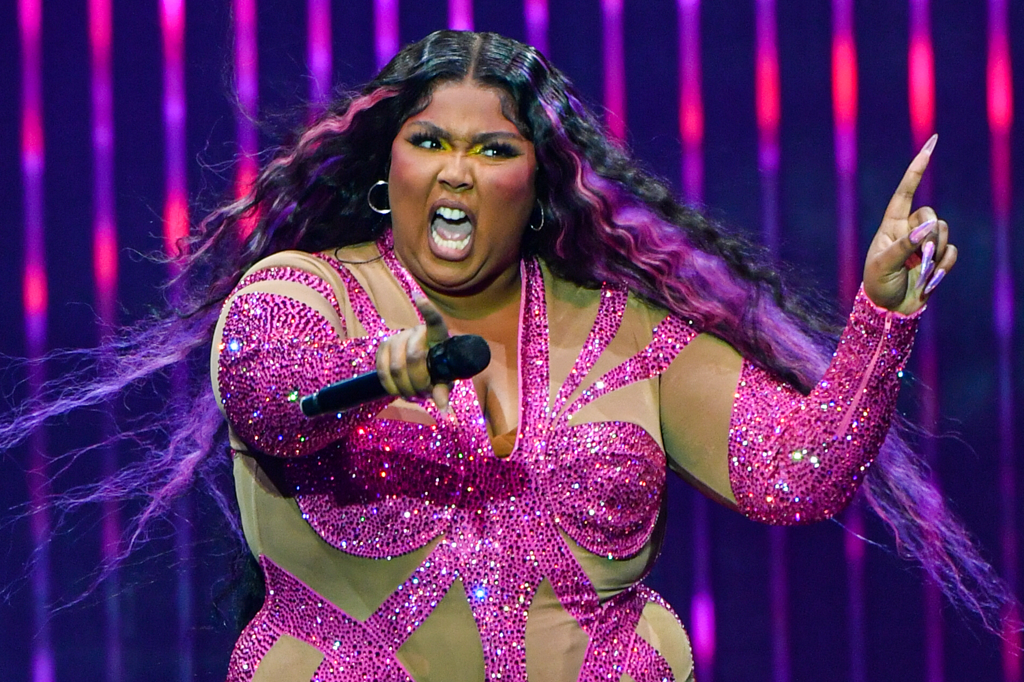 Lizzo performs onstage at Little Caesars Arena on October 06, 2022 in Detroit, Michigan. | Source: Getty Images