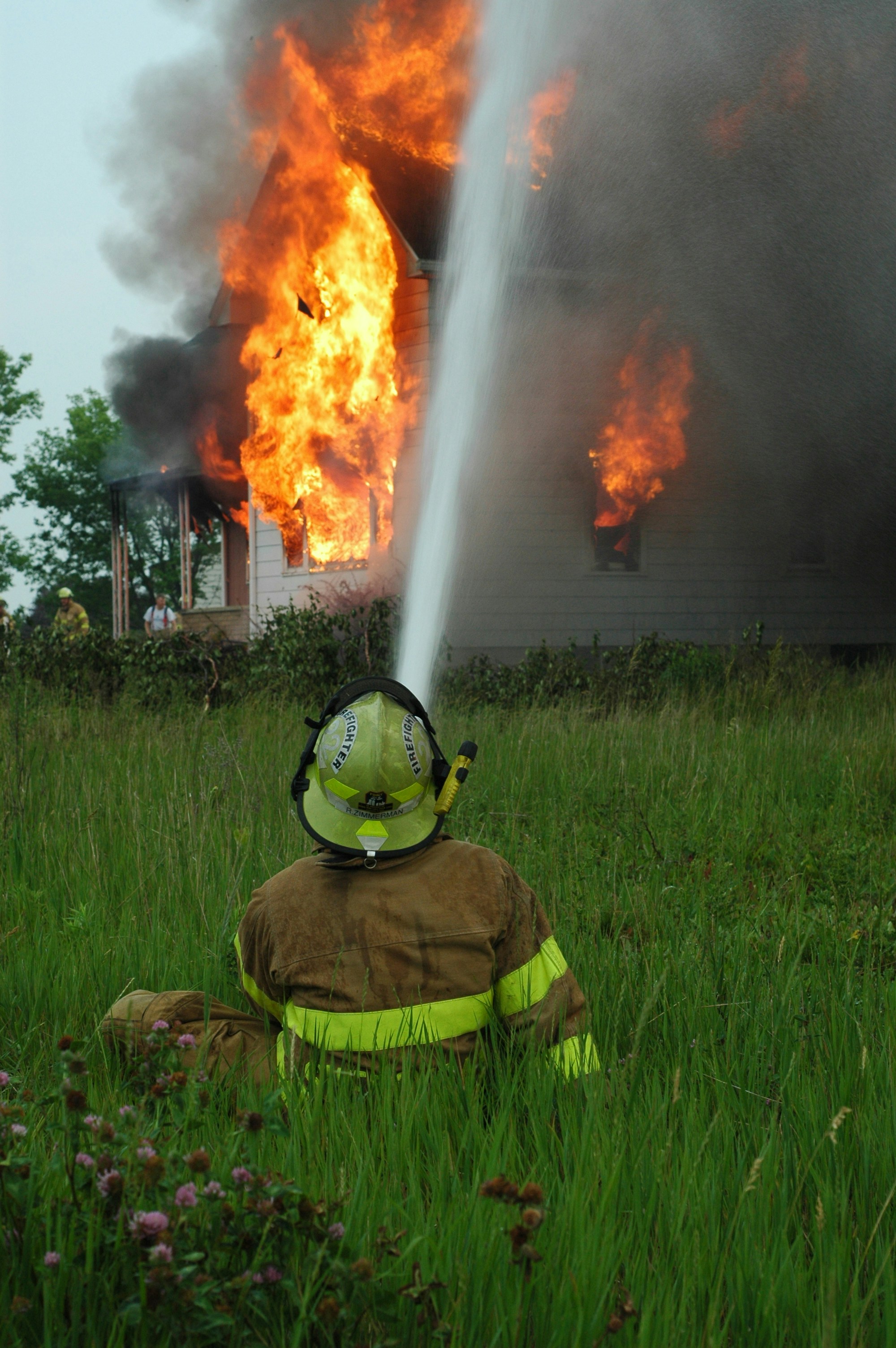 Firemen extinguishing a fire | Source: Unsplash