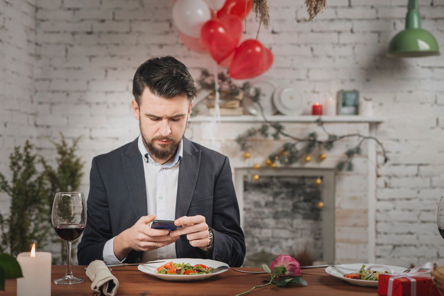 Concerned man on a Christmas dinner | Source: Freepik