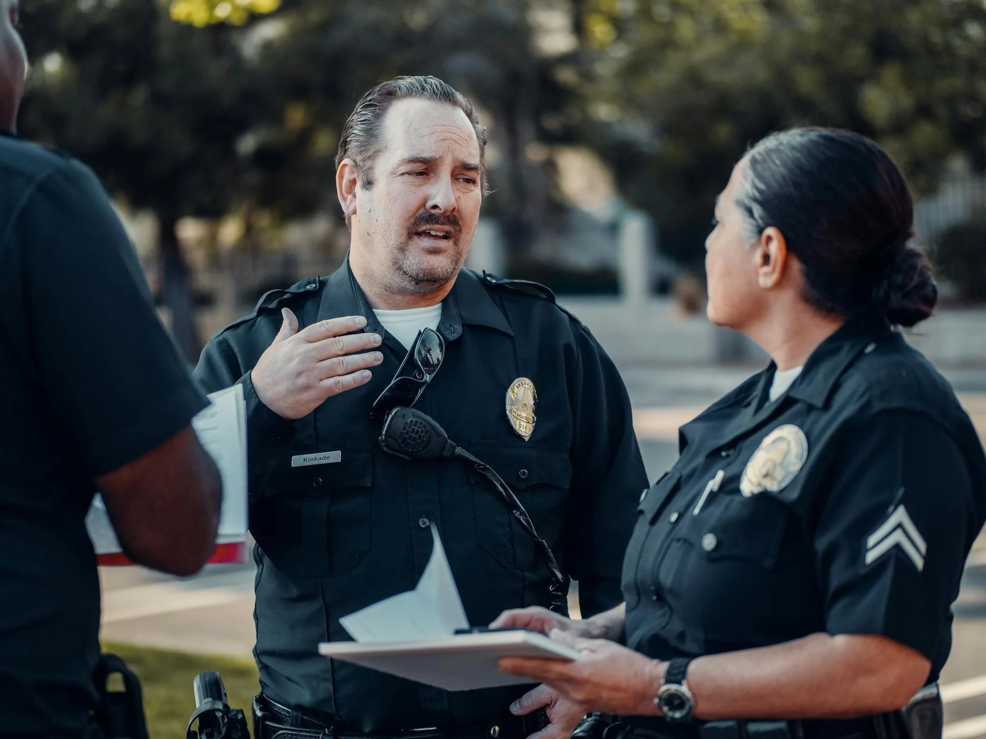 A policeman talking to his colleague | Source: Pexels