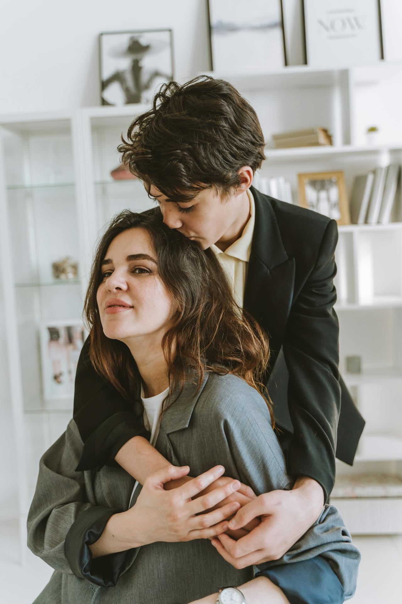 My Sister Excluded My Son from Her Wedding After He Made Her Dress, but Still Expected to Wear It – We Gave Her One Condition to Keep It 21 An affectionate son kissing his mother on her head | Source: Pexels