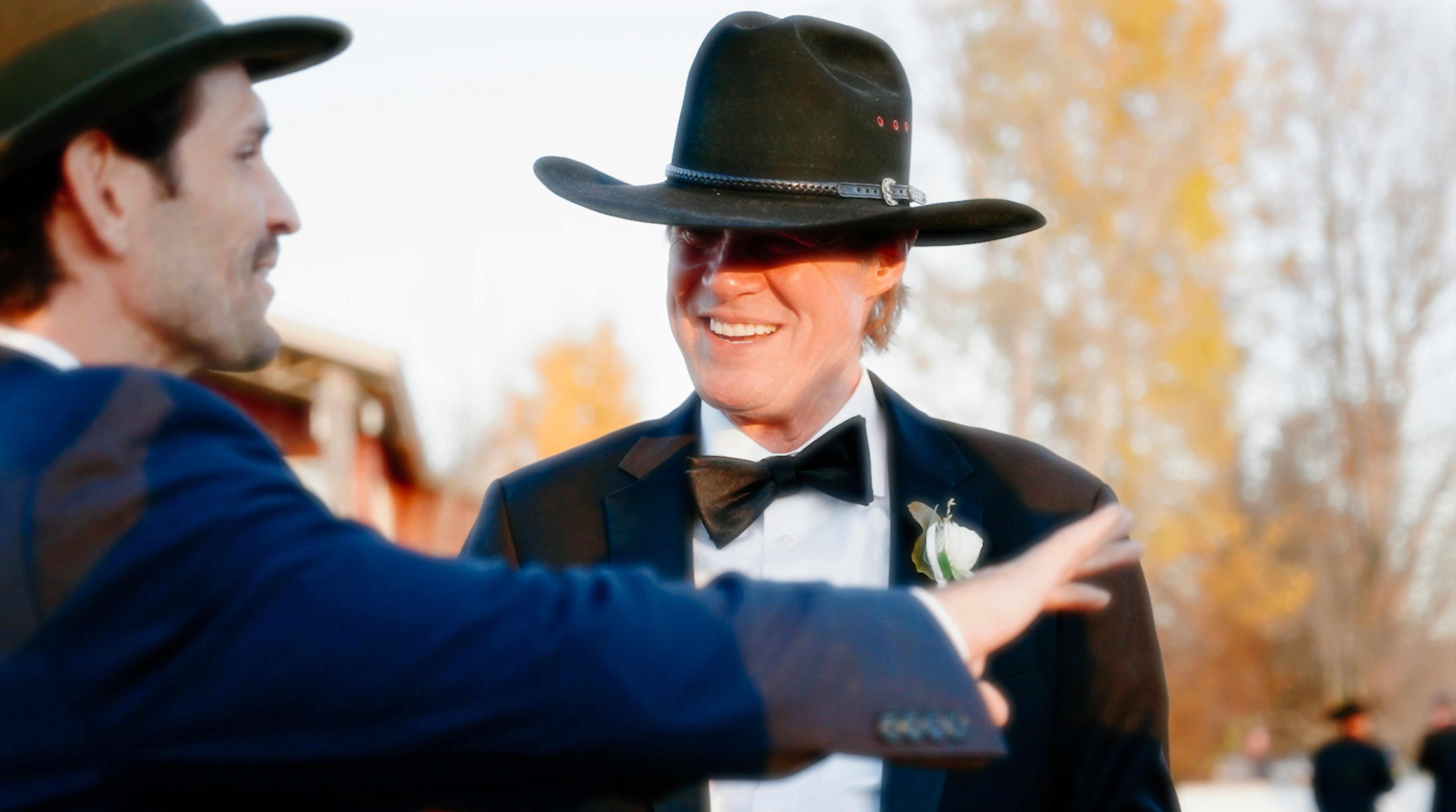 Men in suits talking | Source: Unsplash