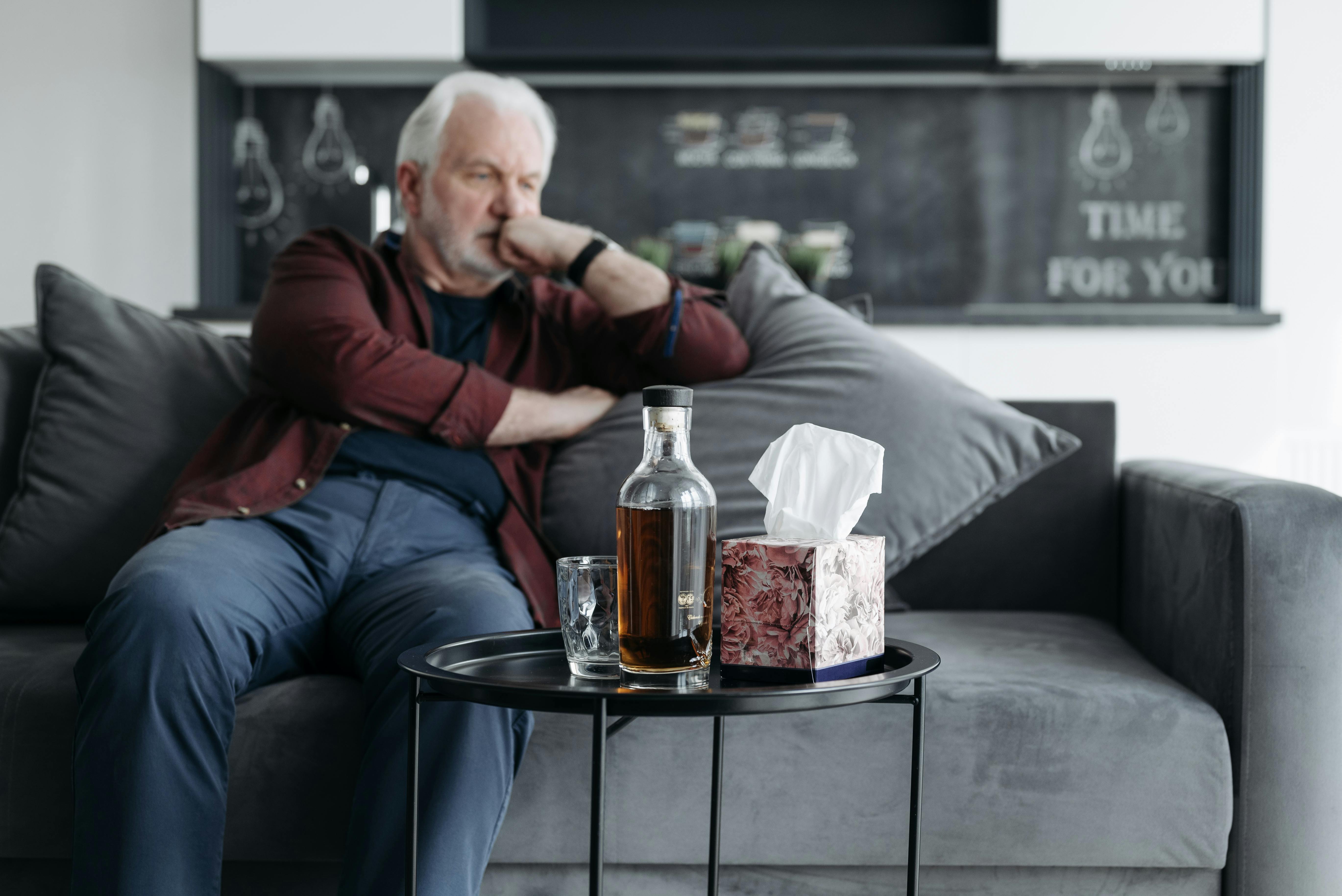 A man sitting on the couch | Source: Pexels
