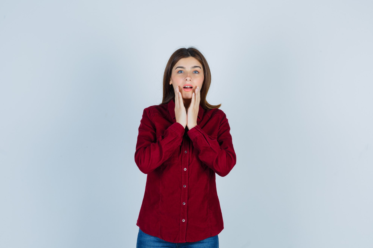 A startled woman | Source: Freepik