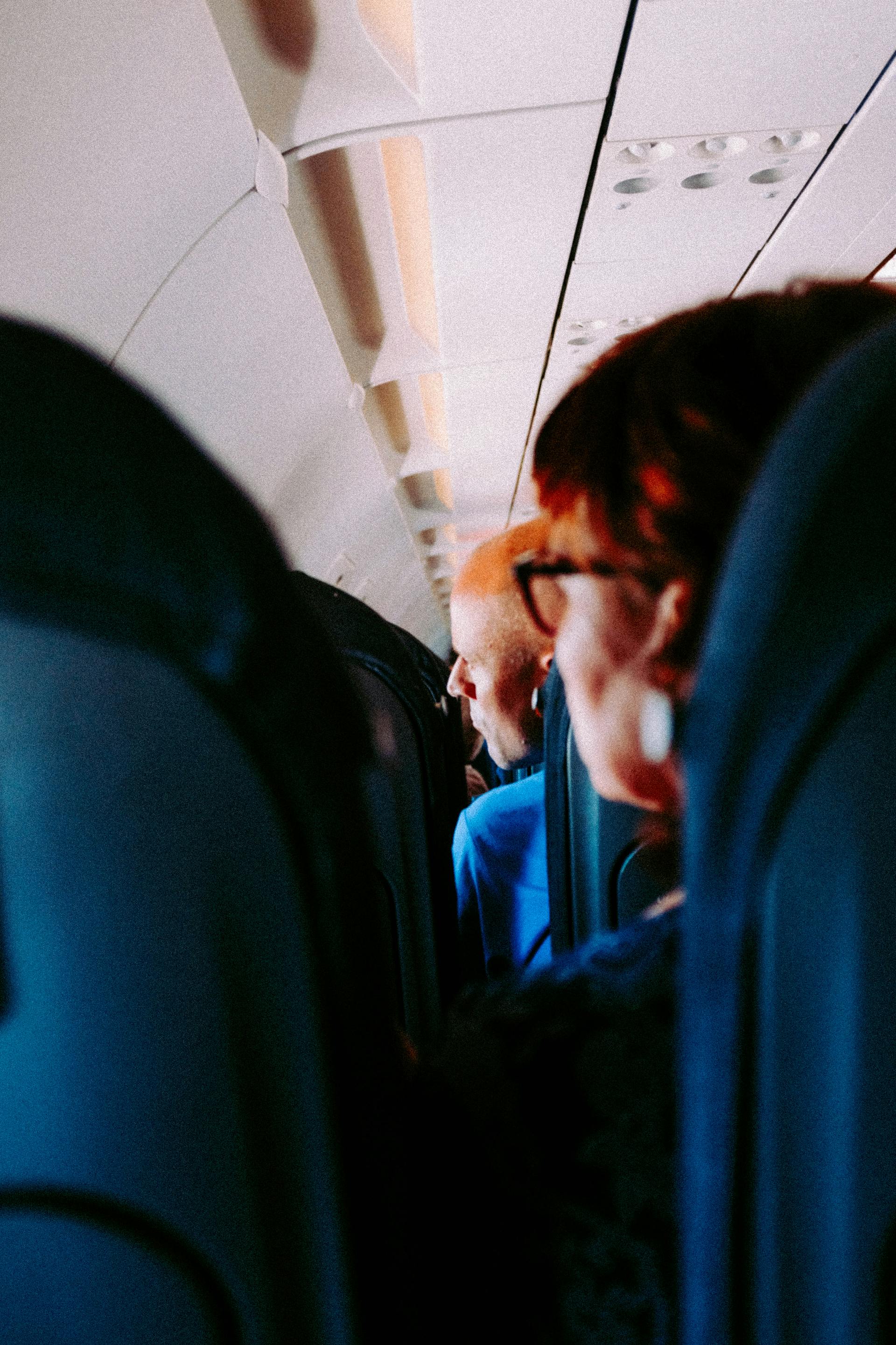 People seated on an airplane | Source: Pexels