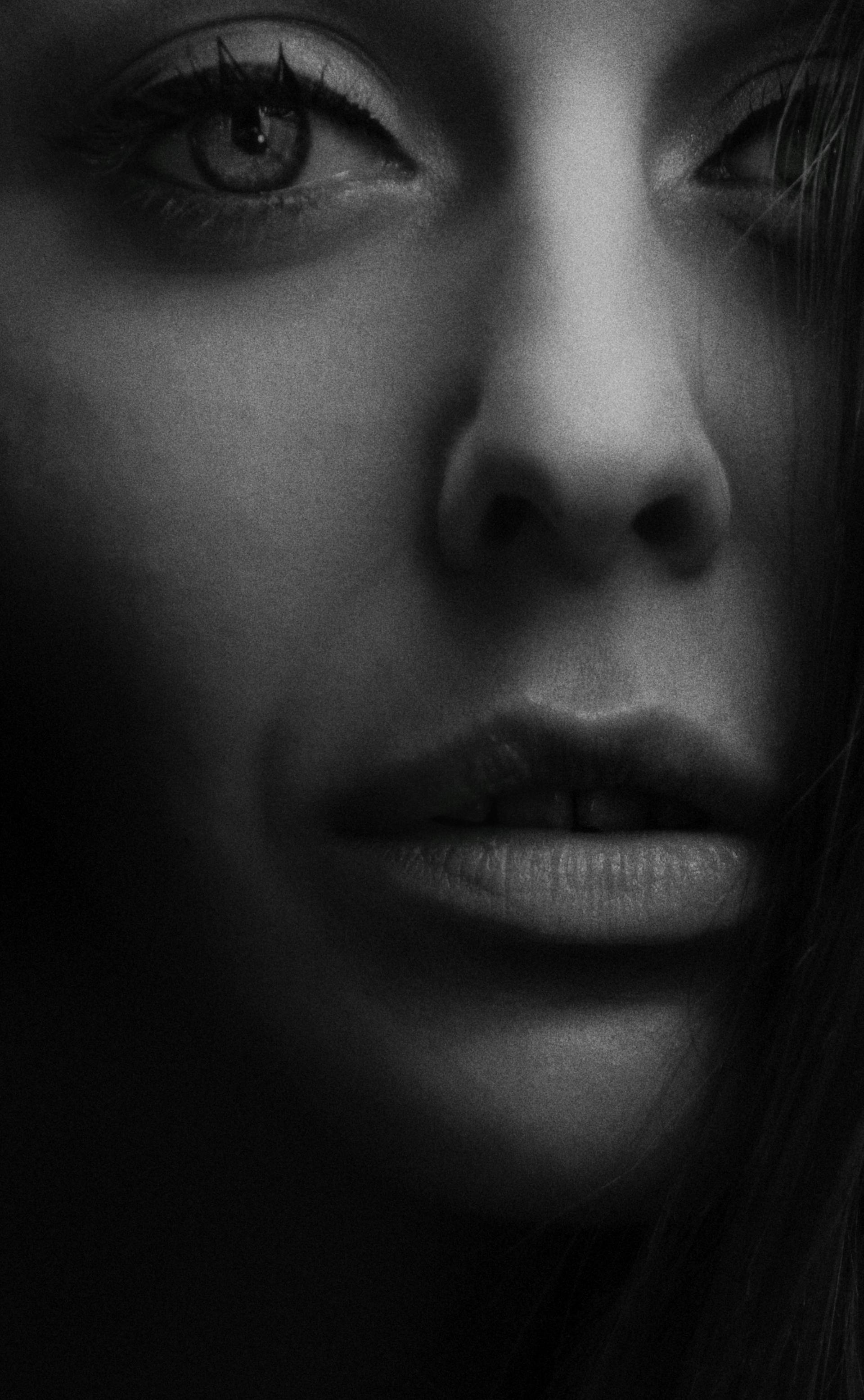 A grayscale close-up shot of a woman's face | Source: Pexels