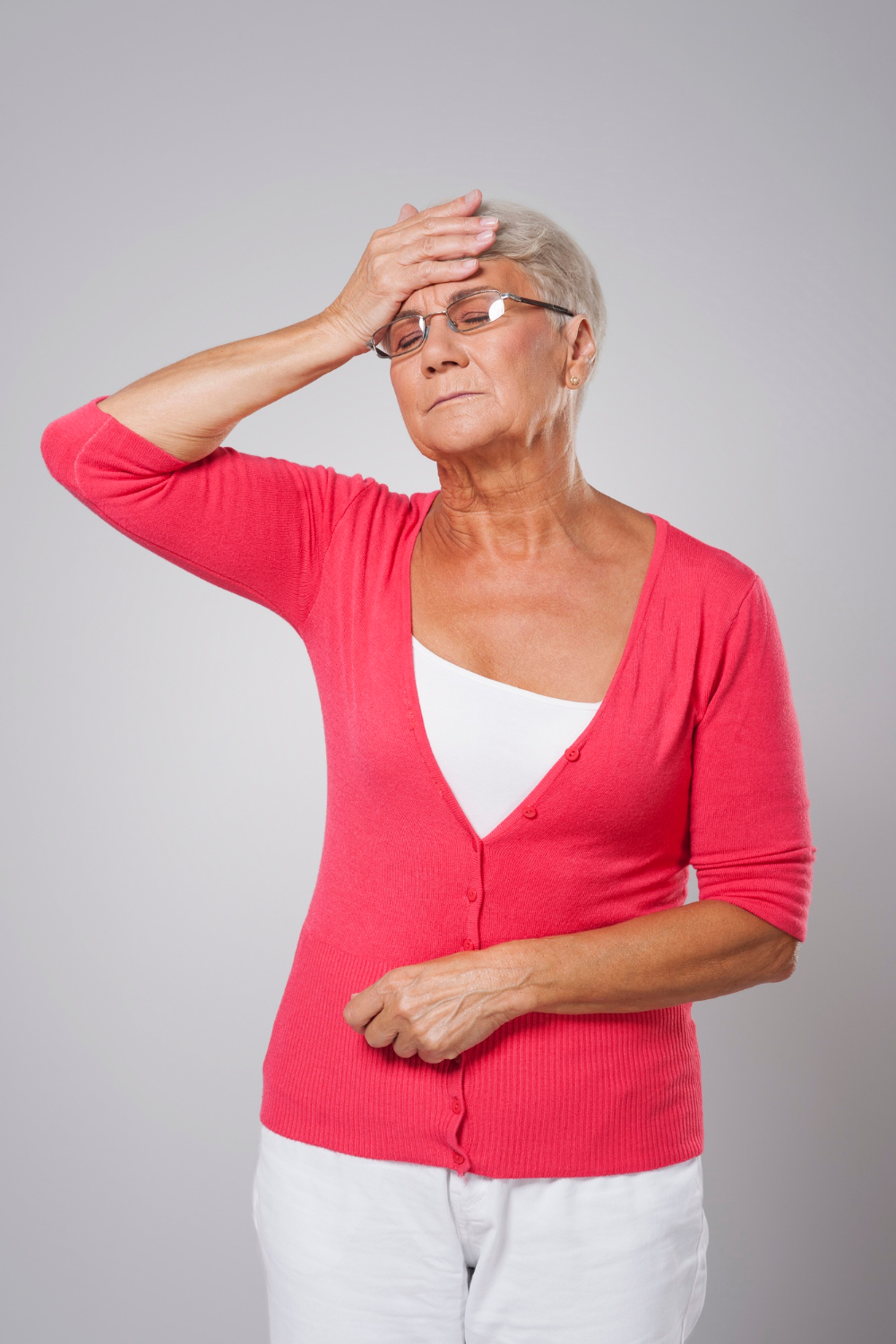 A disheartened elderly woman | Source: Freepik