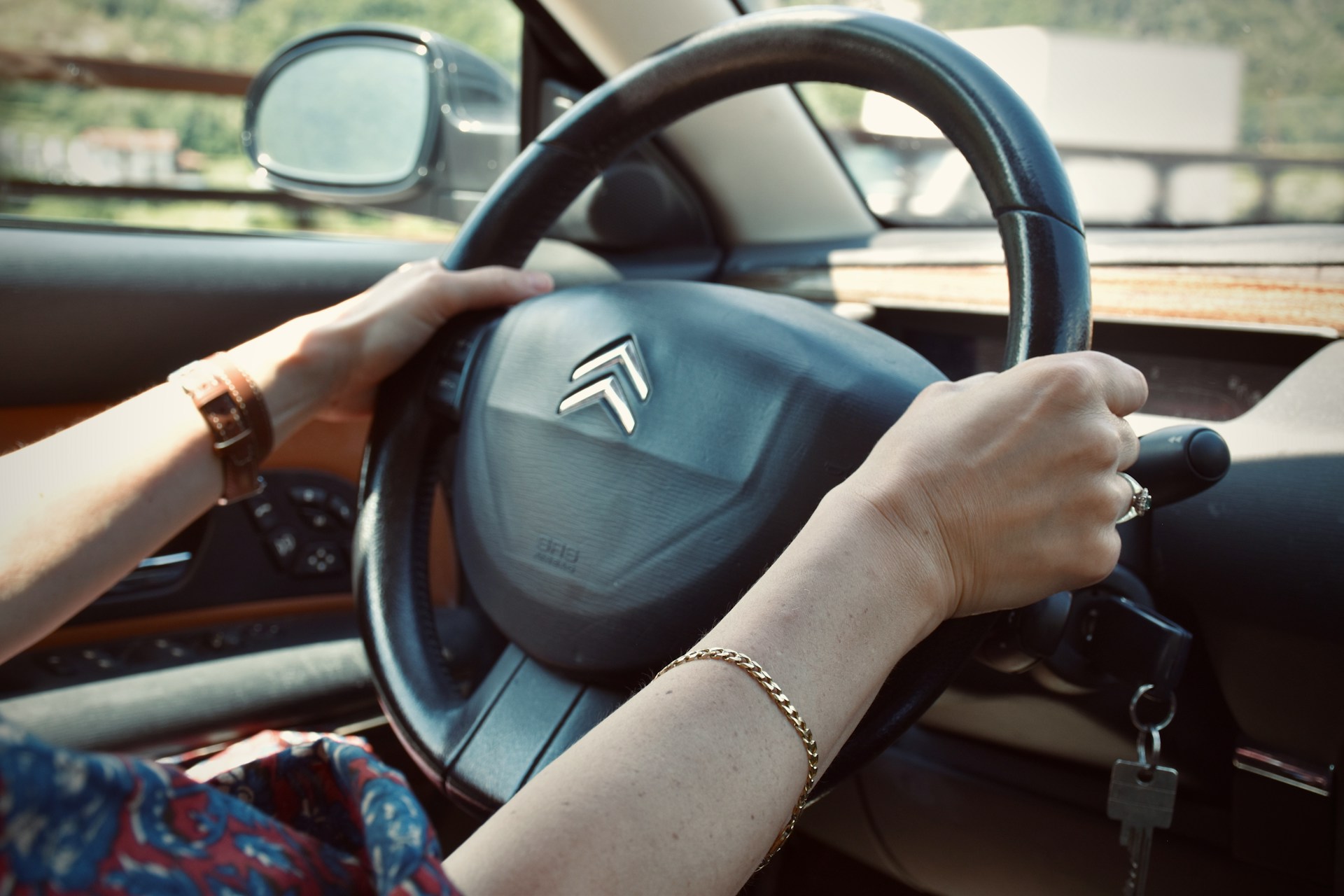 A woman driving a car | Source: Unsplash