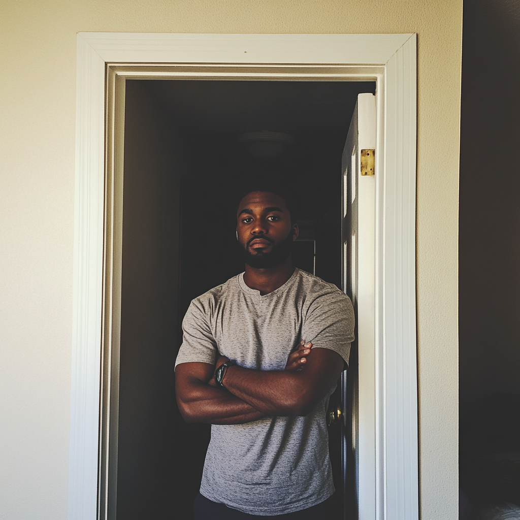 A man standing in a doorway | Source: Midjourney