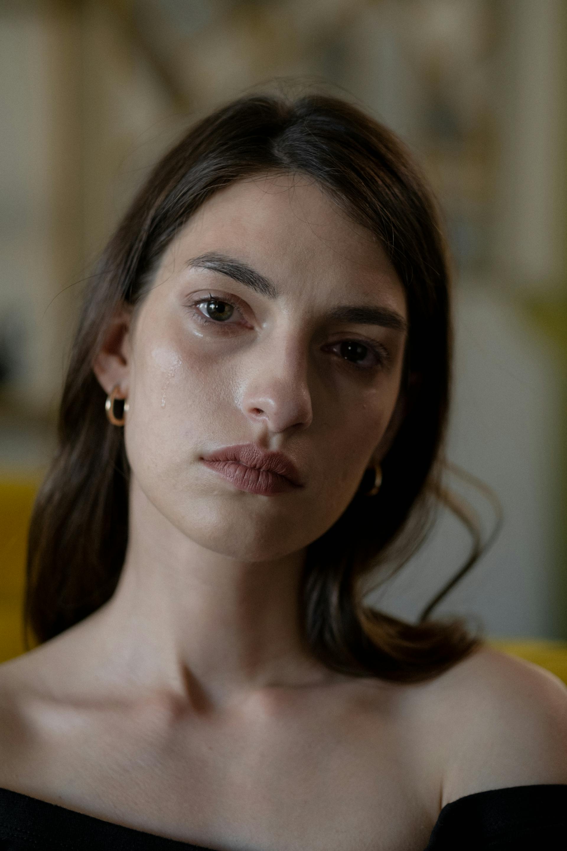 A woman staring sadly at someone | Source: Pexels