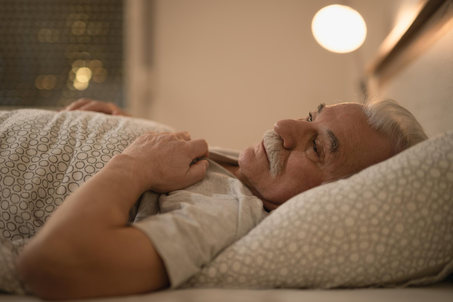 A bedridden older man | Source: Freepik