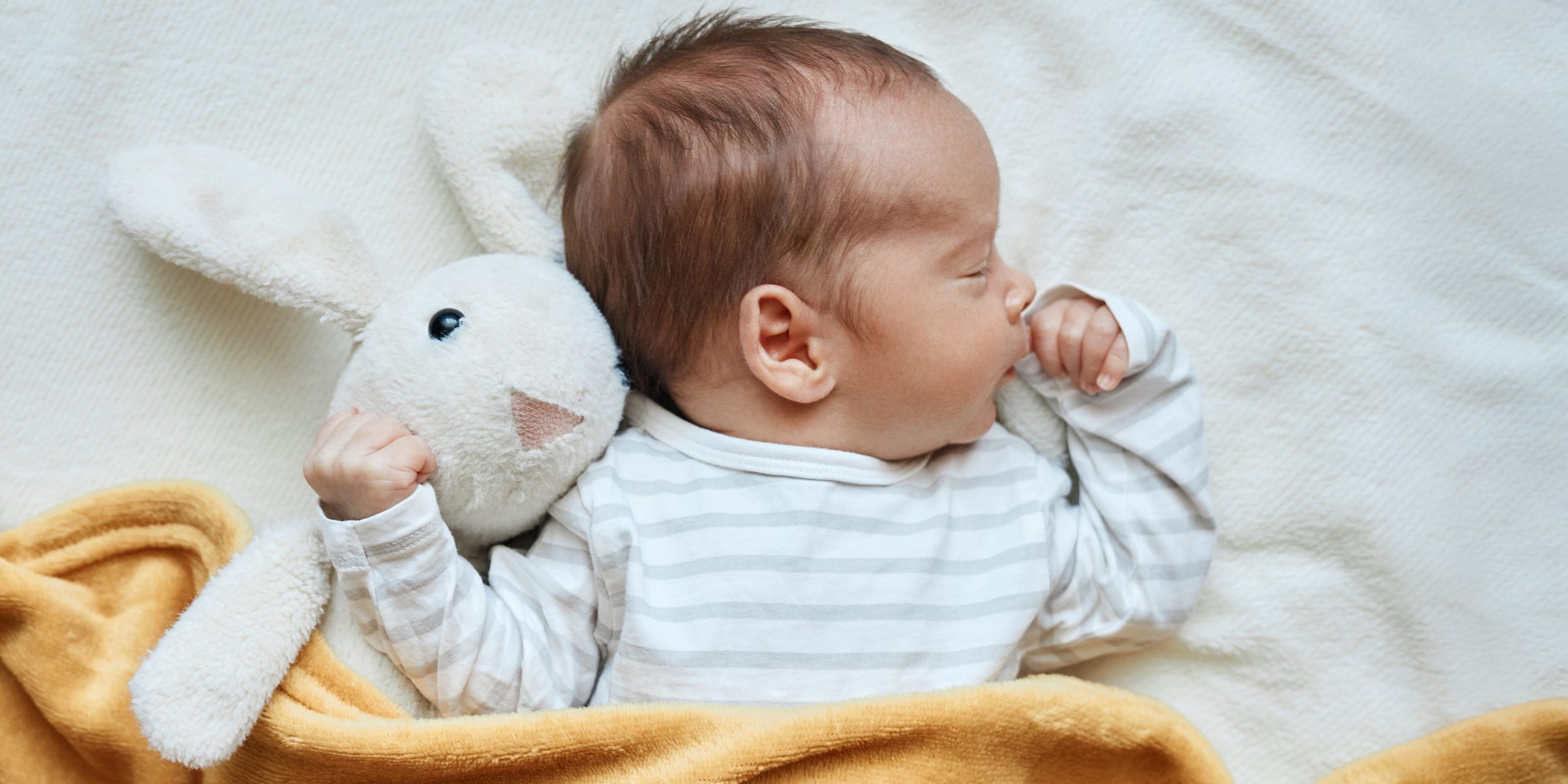 A sleeping newborn baby ⏐ Source: Shutterstock