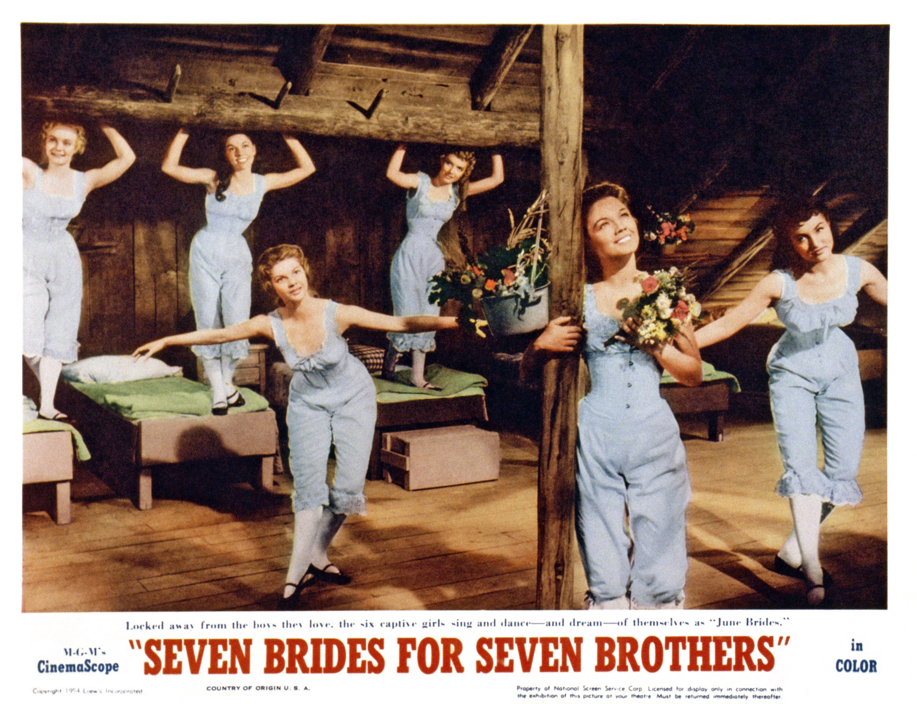 The actress and musician performs alongside fellow cast members in "Seven Brides for Seven Brothers," circa 1954 | Source: Getty Images