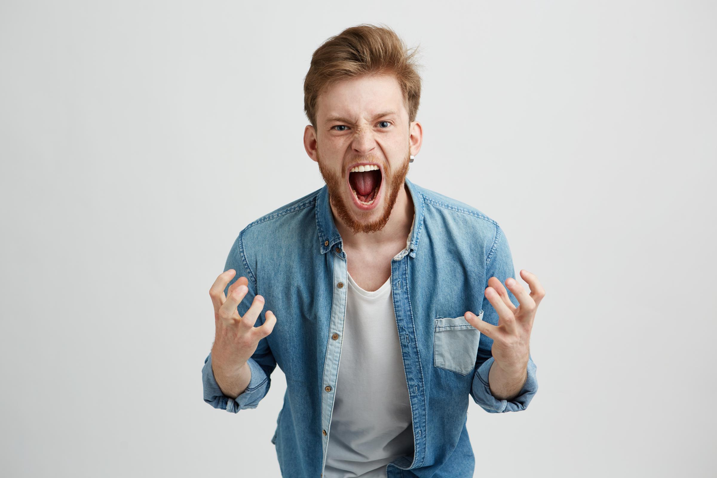 An angry shouting man | Source: Freepik