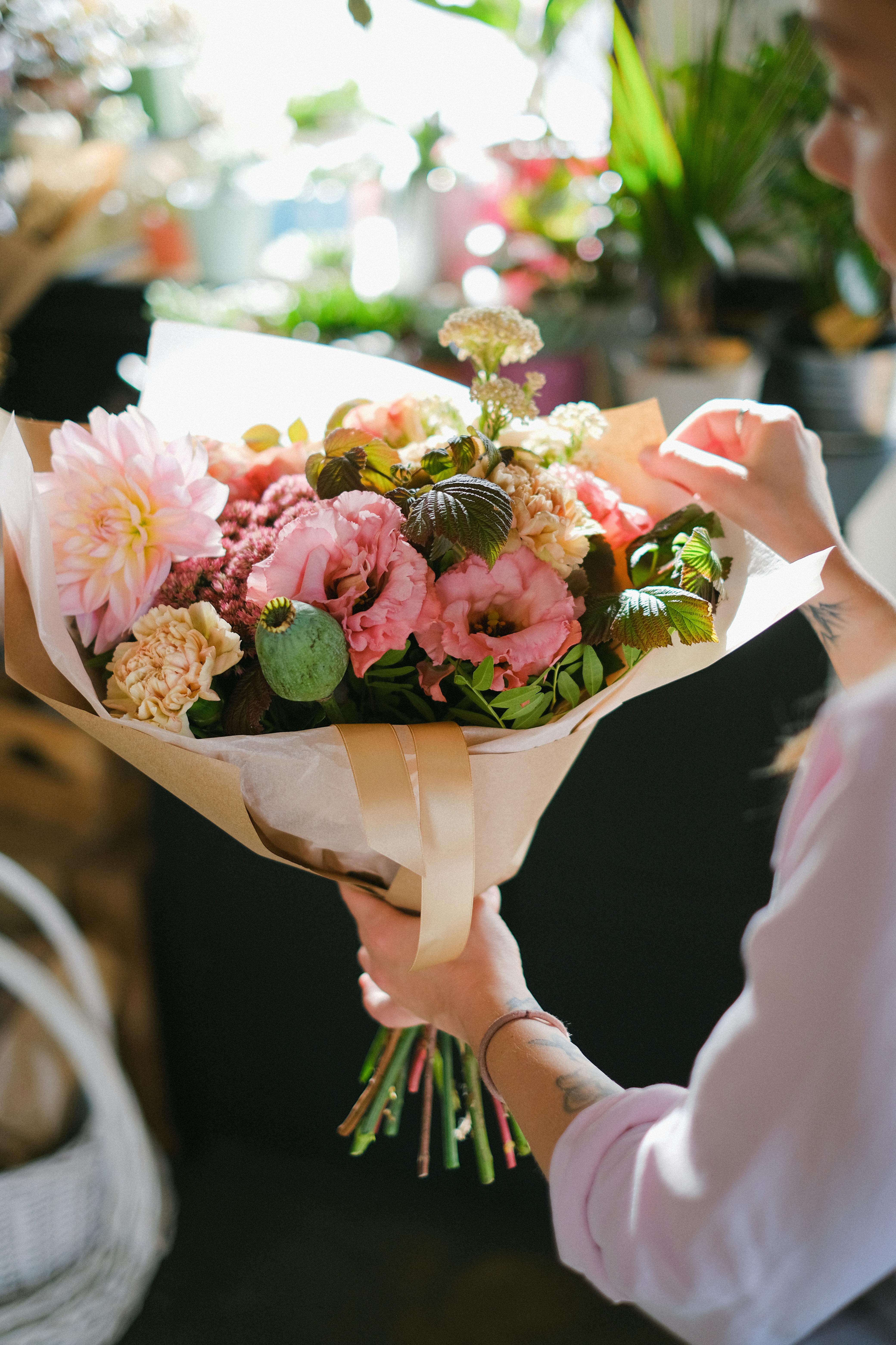 A person holding a bouquet of flowers | Source: Pexels