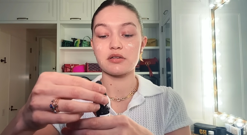 Gigi Hadid doing her skincare routine from a video dated February 4, 2021. | Source: YouTube/Vogue