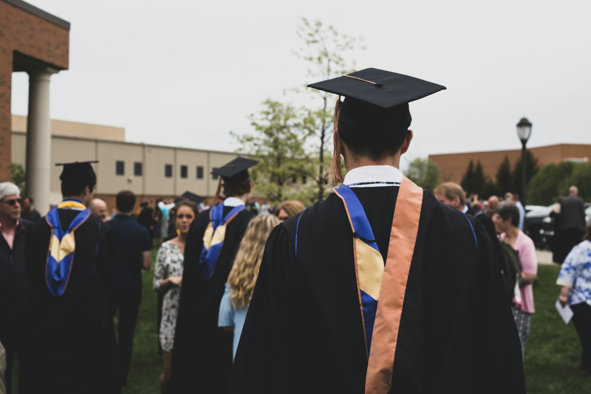 Students at a graduation ceremony | Source: Unsplash