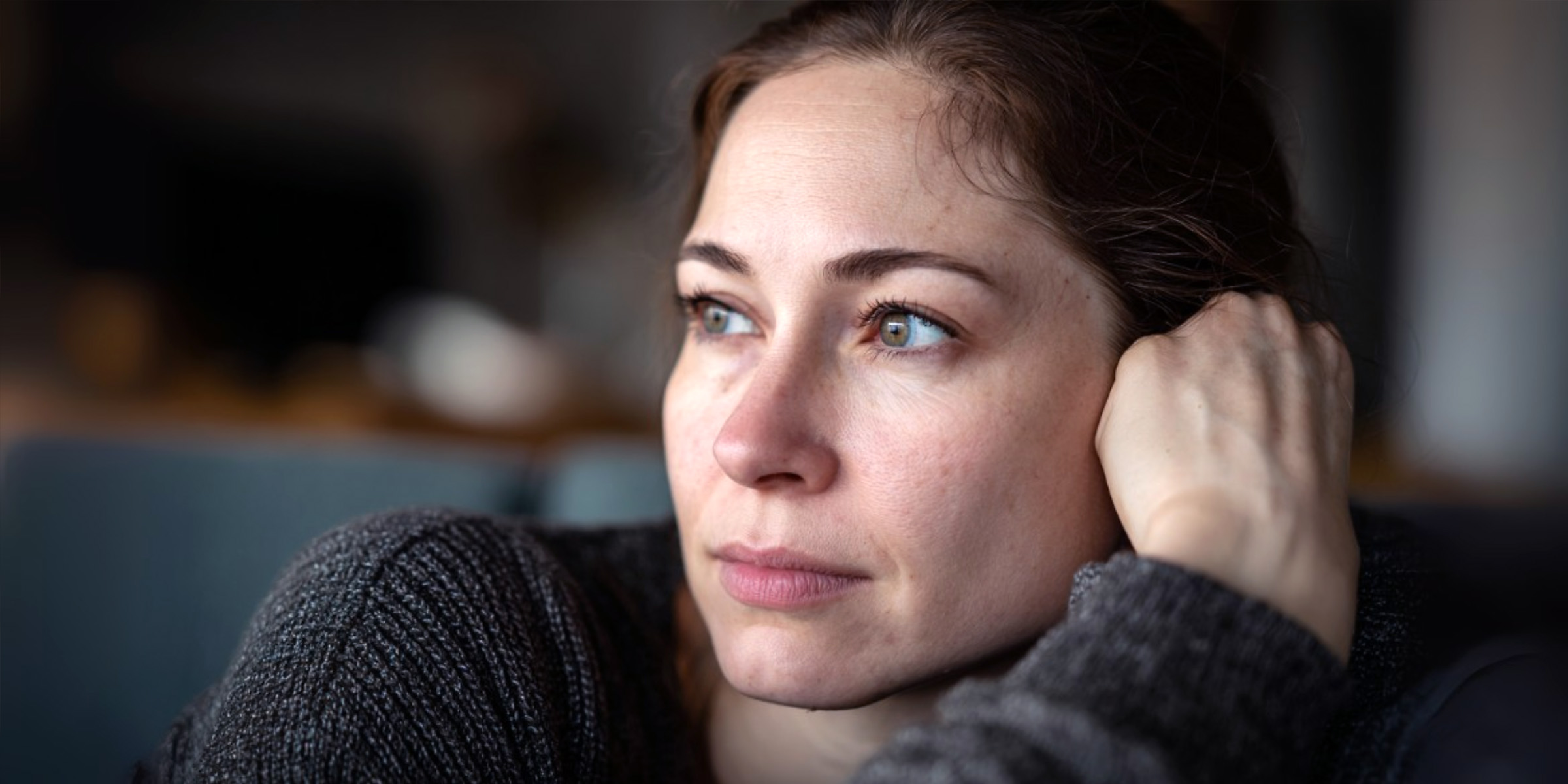 A close up of a pensive woman | Source: The Celebritist