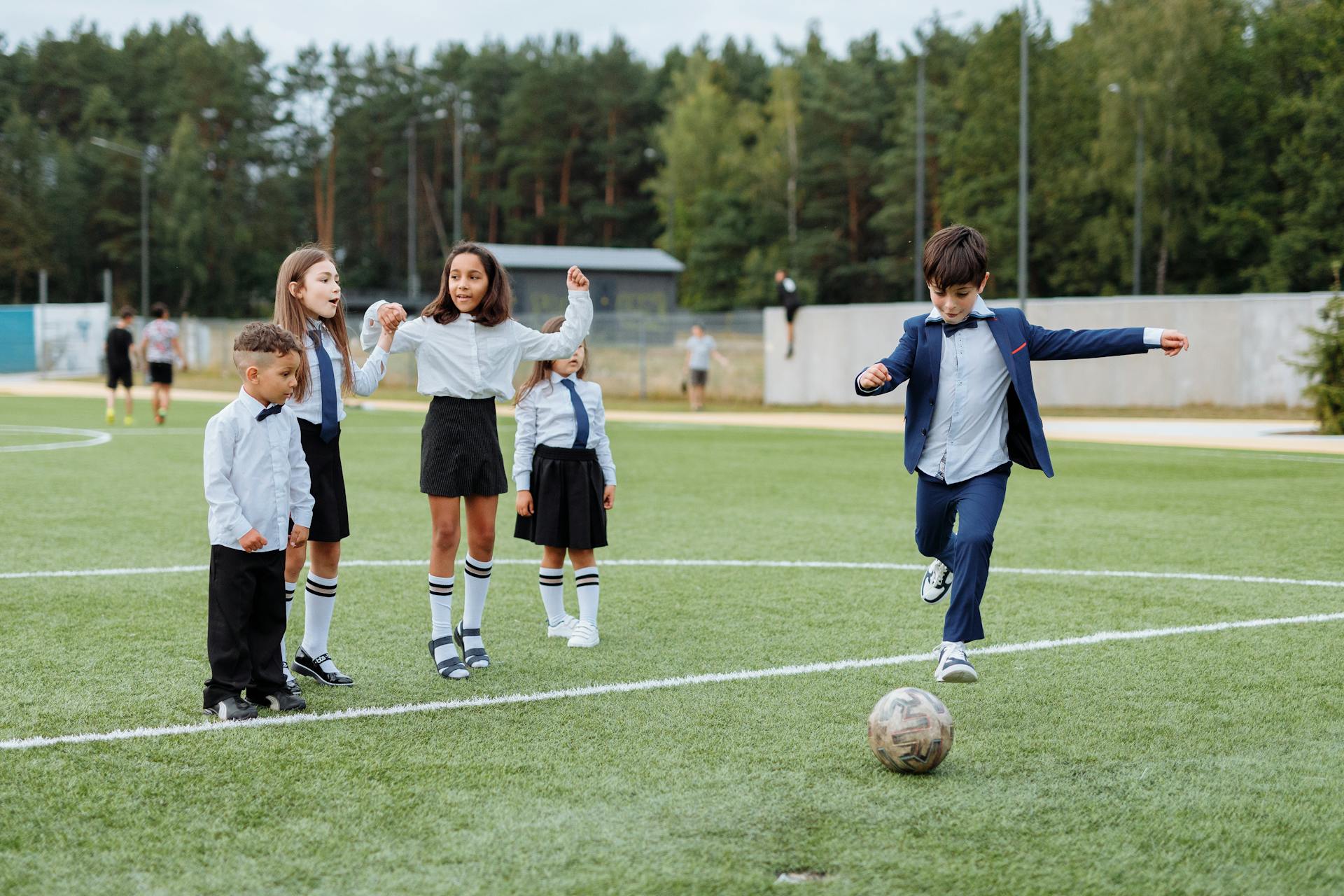 Kids playing soccer | Source: Pexels