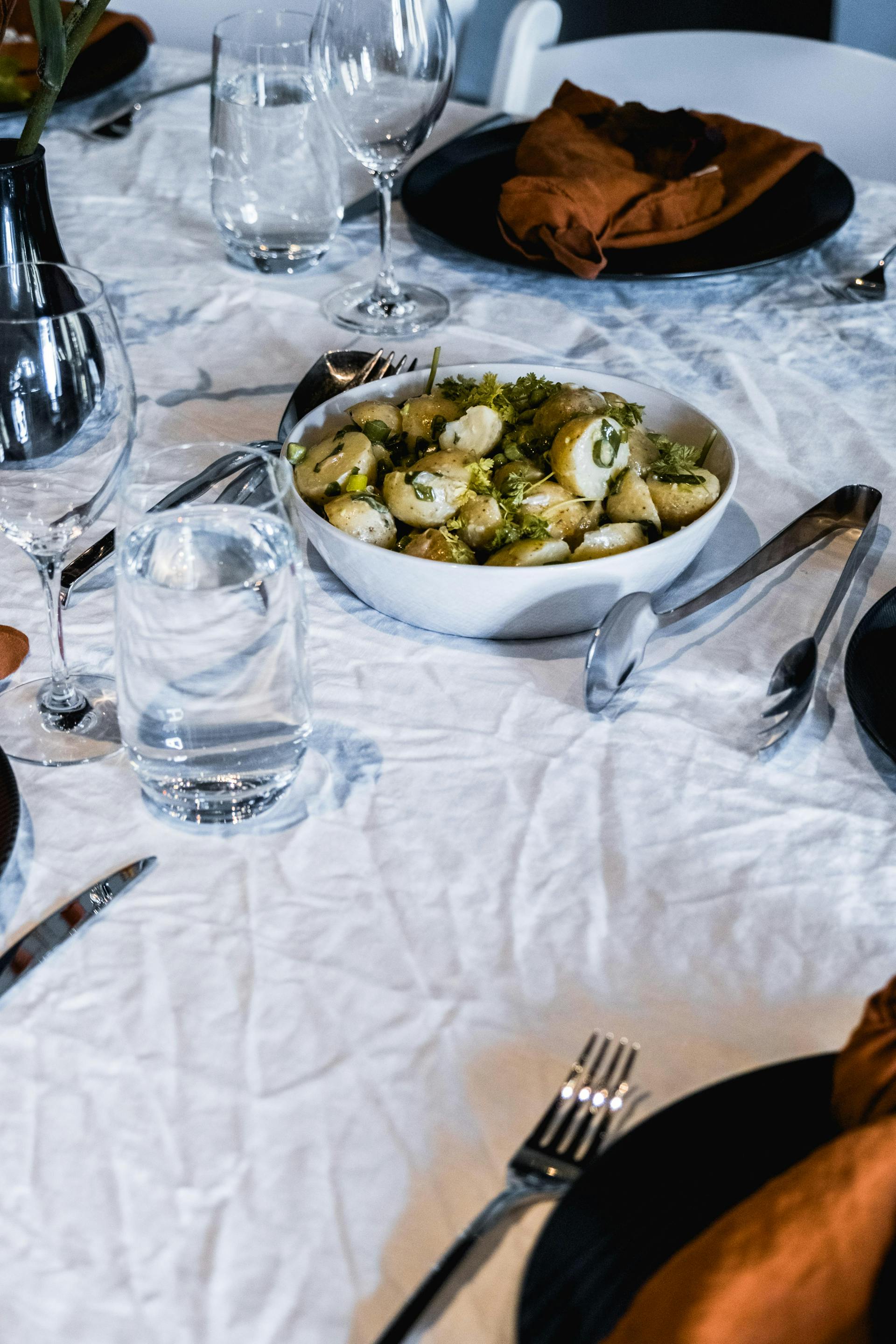 Potato salad on a dining table | Source: Pexels