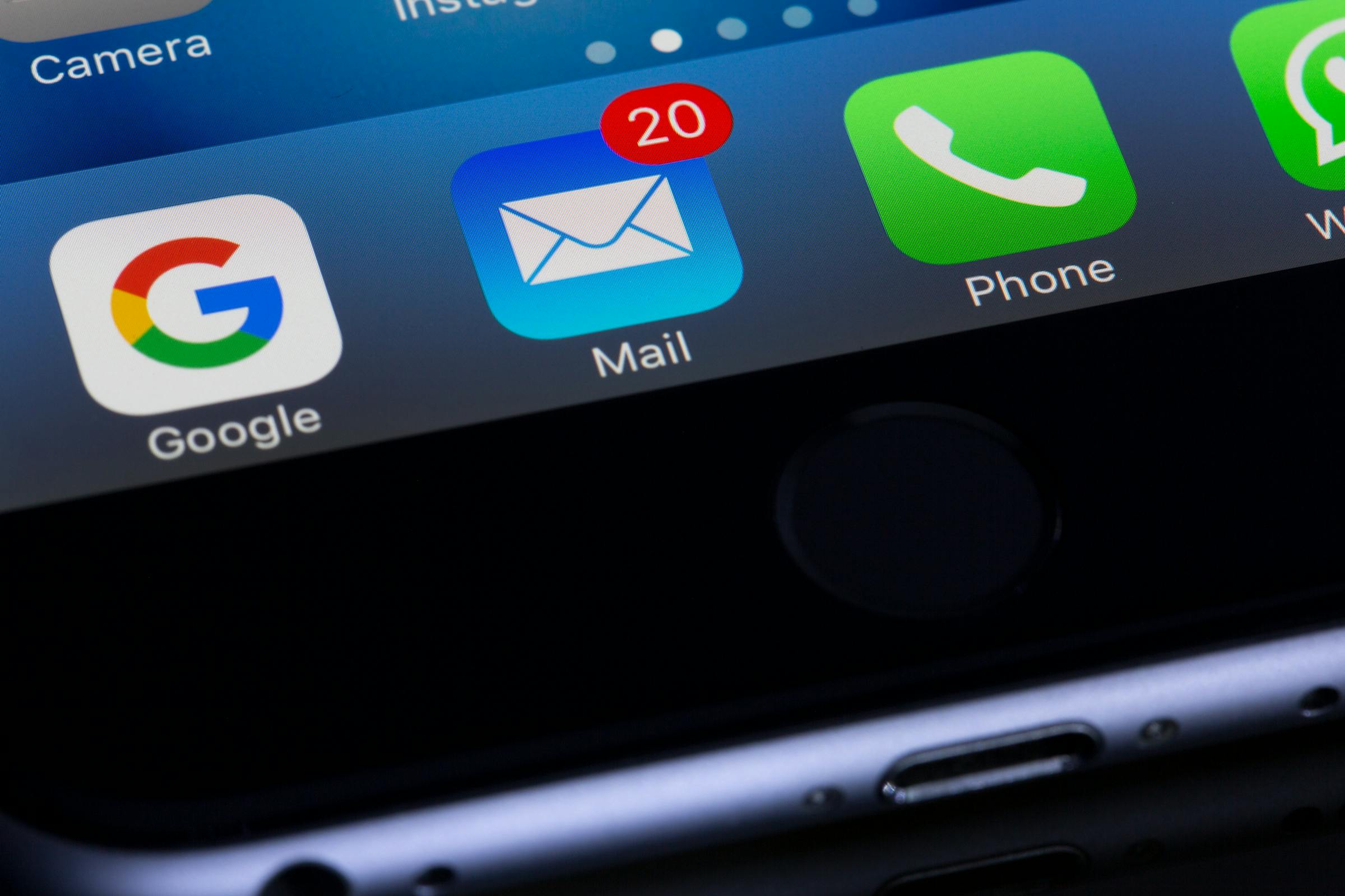 A phone screen displaying an email inbox with notifications | Source: Pexels