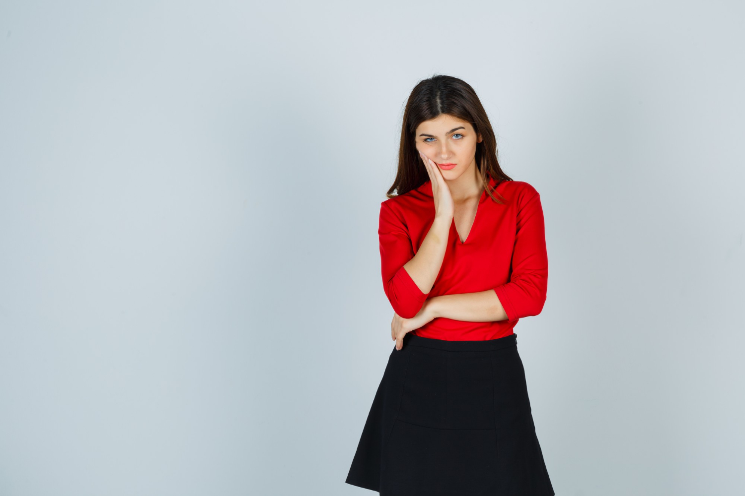 A frustrated young woman | Source: Freepik