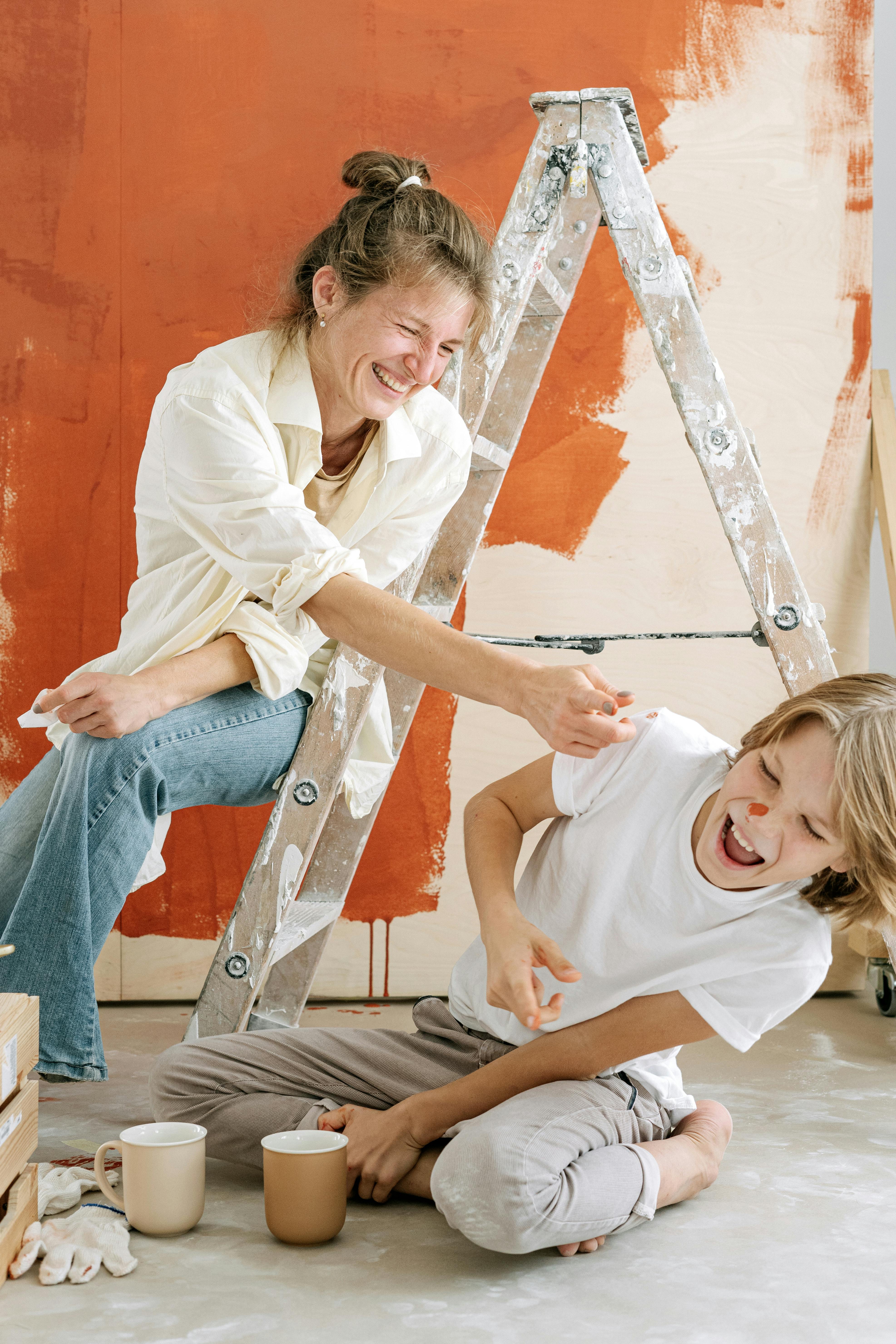 A woman having fun with her son | Source: Pexels