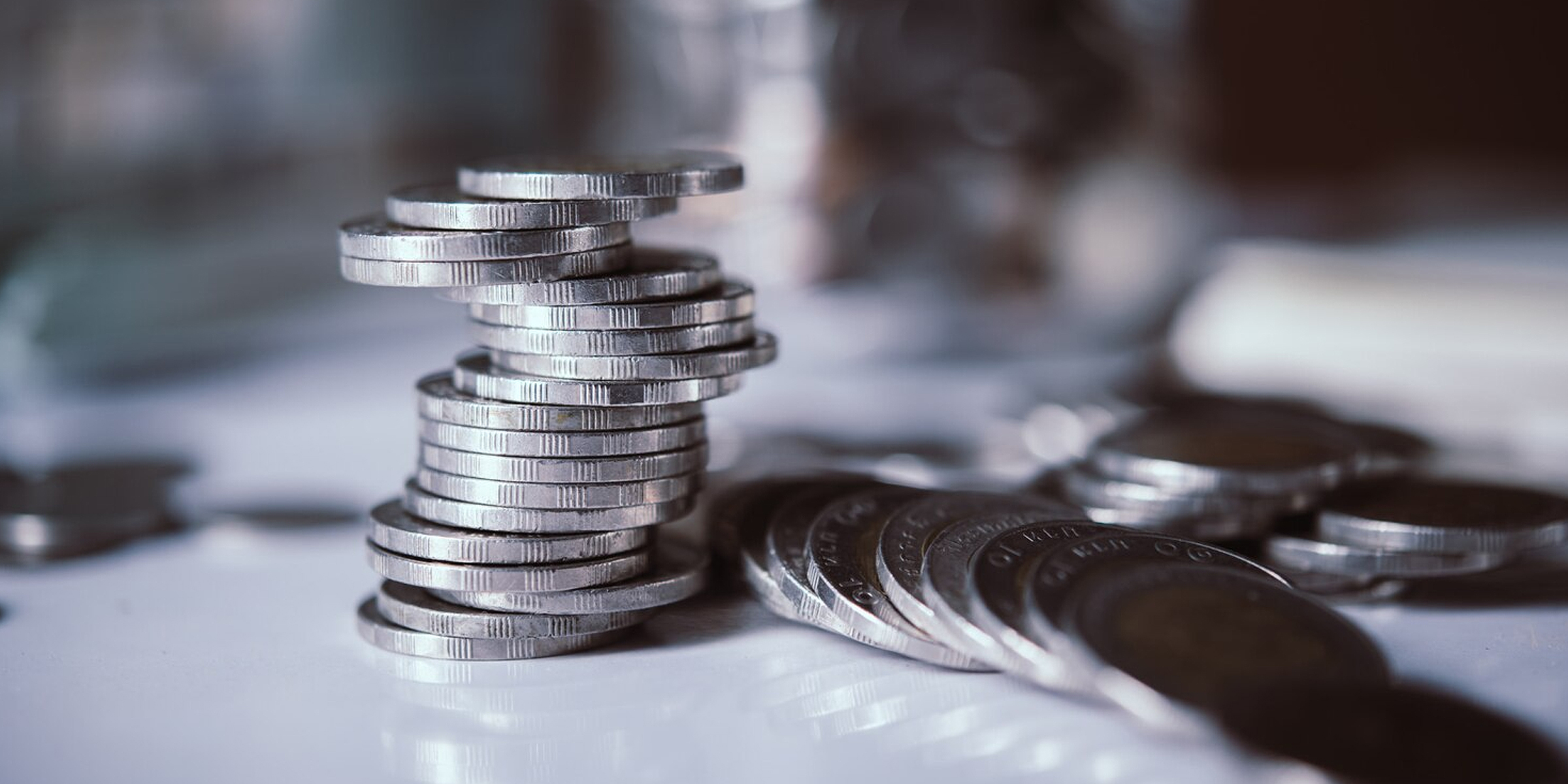 A stack of coins | Source: Freepik