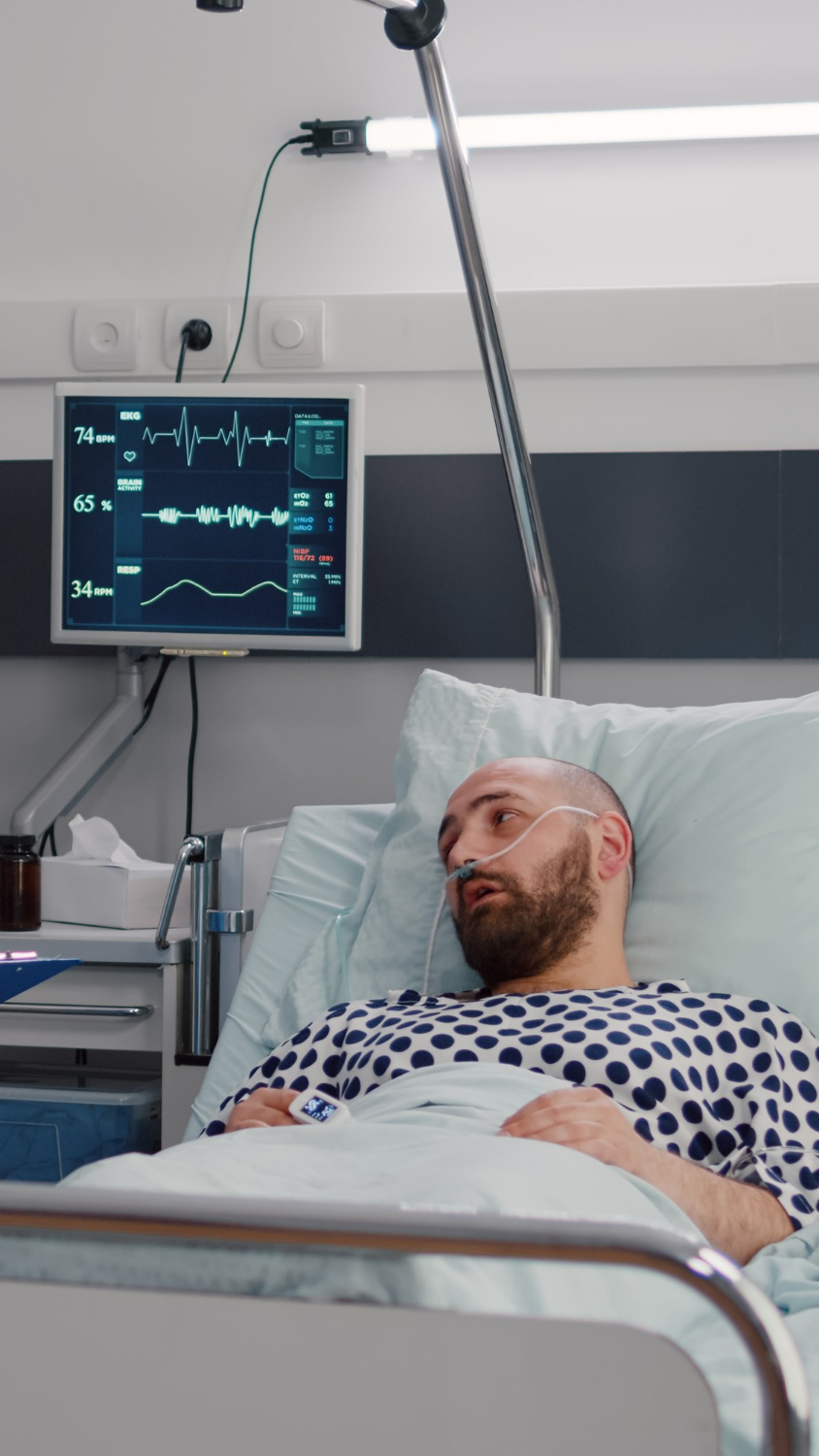 A hospitalized sick man | Source: Freepik